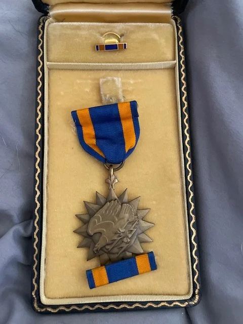 This is the Air Medal that was awarded to 2nd LT Bruce Nostrand for his heroic actions during his nineteenth mission, in the Battle of Luzon in the Philippines. He would successfully complete 30 missions in total before losing his life in the South C