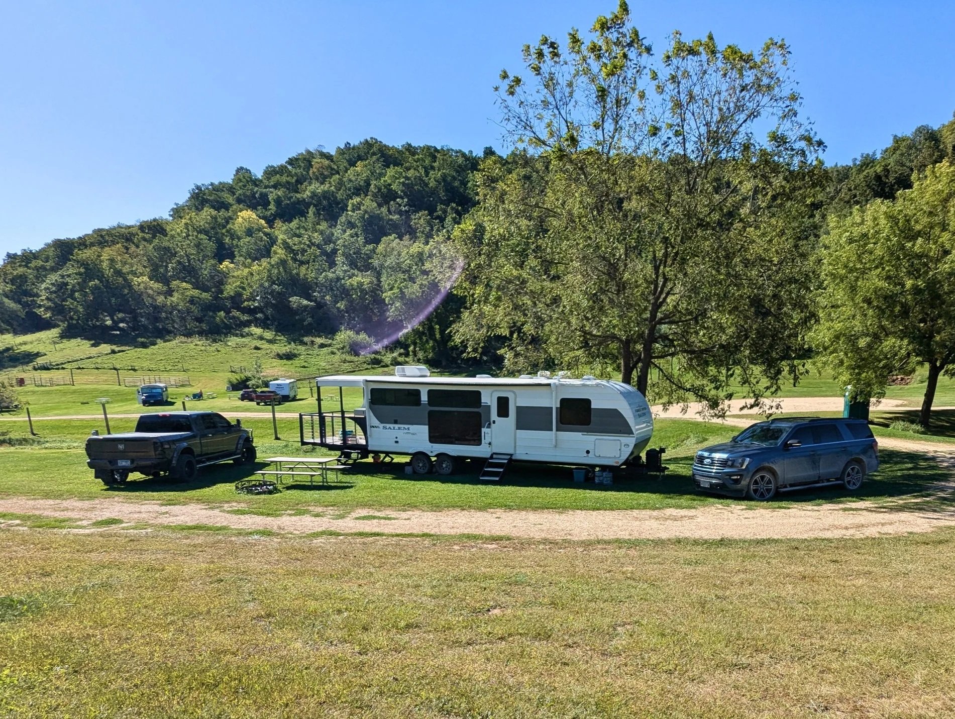 Camper with truck in bluffs - MN