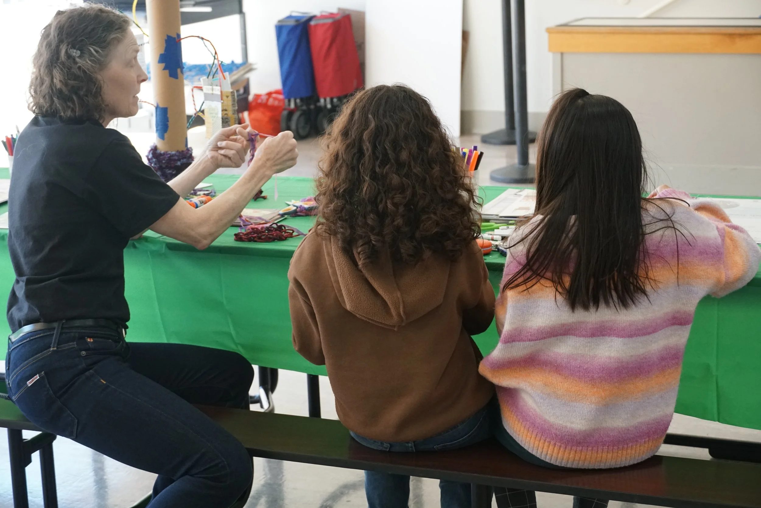 docent helping students.JPG