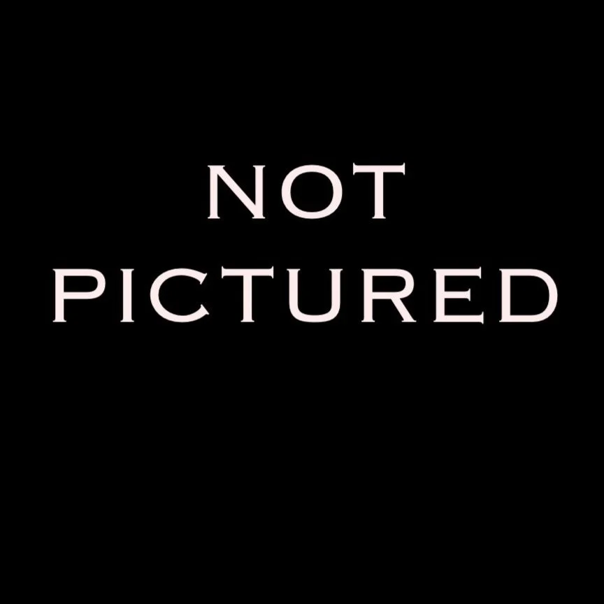 Text reading "NOT PICTURED" on a black background.