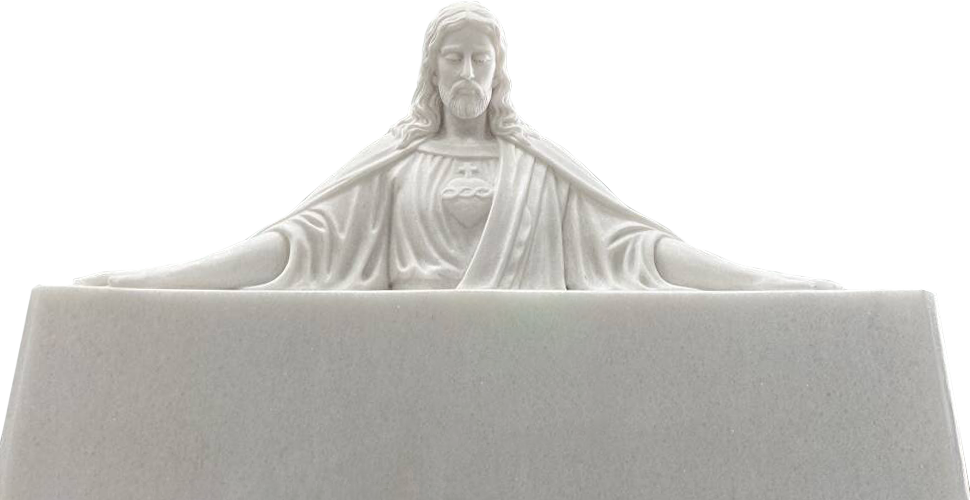 White statue of Jesus Christ with outstretched arms.