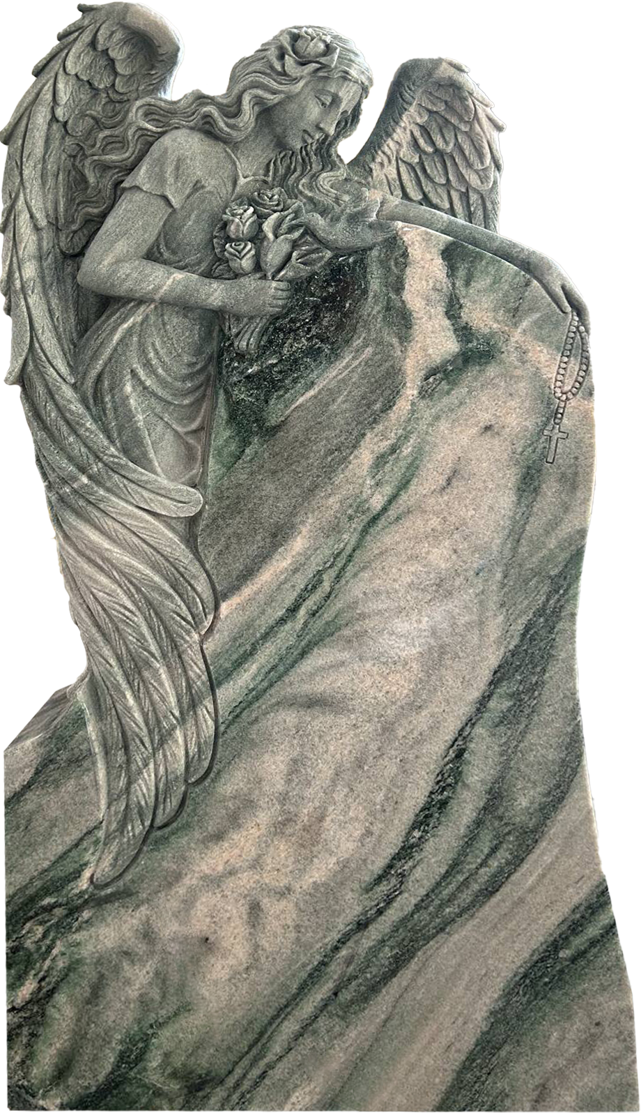 A carved stone sculpture of an angel holding roses and a cross-shaped rosary, leaning on a large stone with a smooth, swirling pattern.