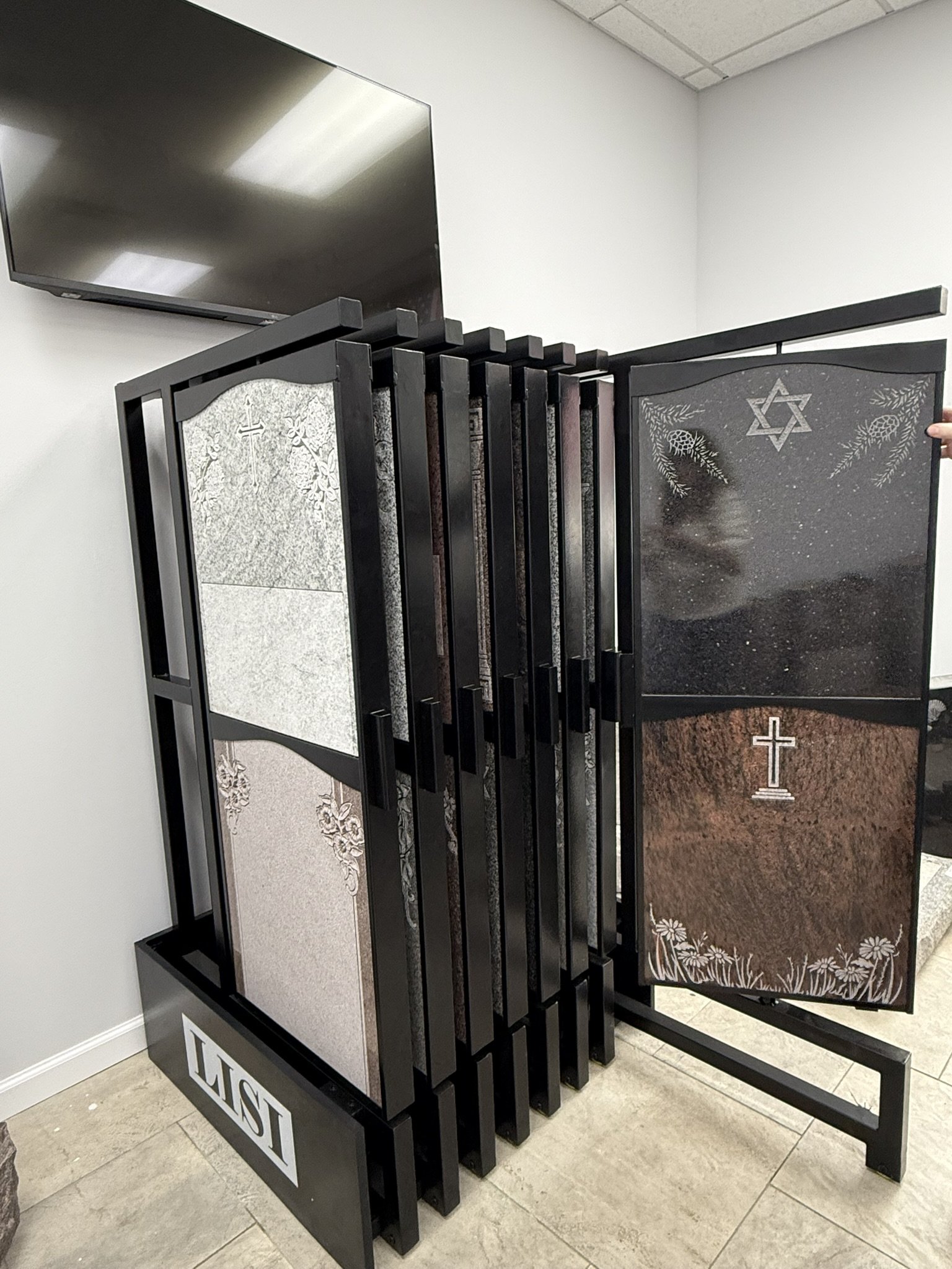 Monument Display Stand showcasing 32 granites in a 3 foot by 3 foot footprint. 