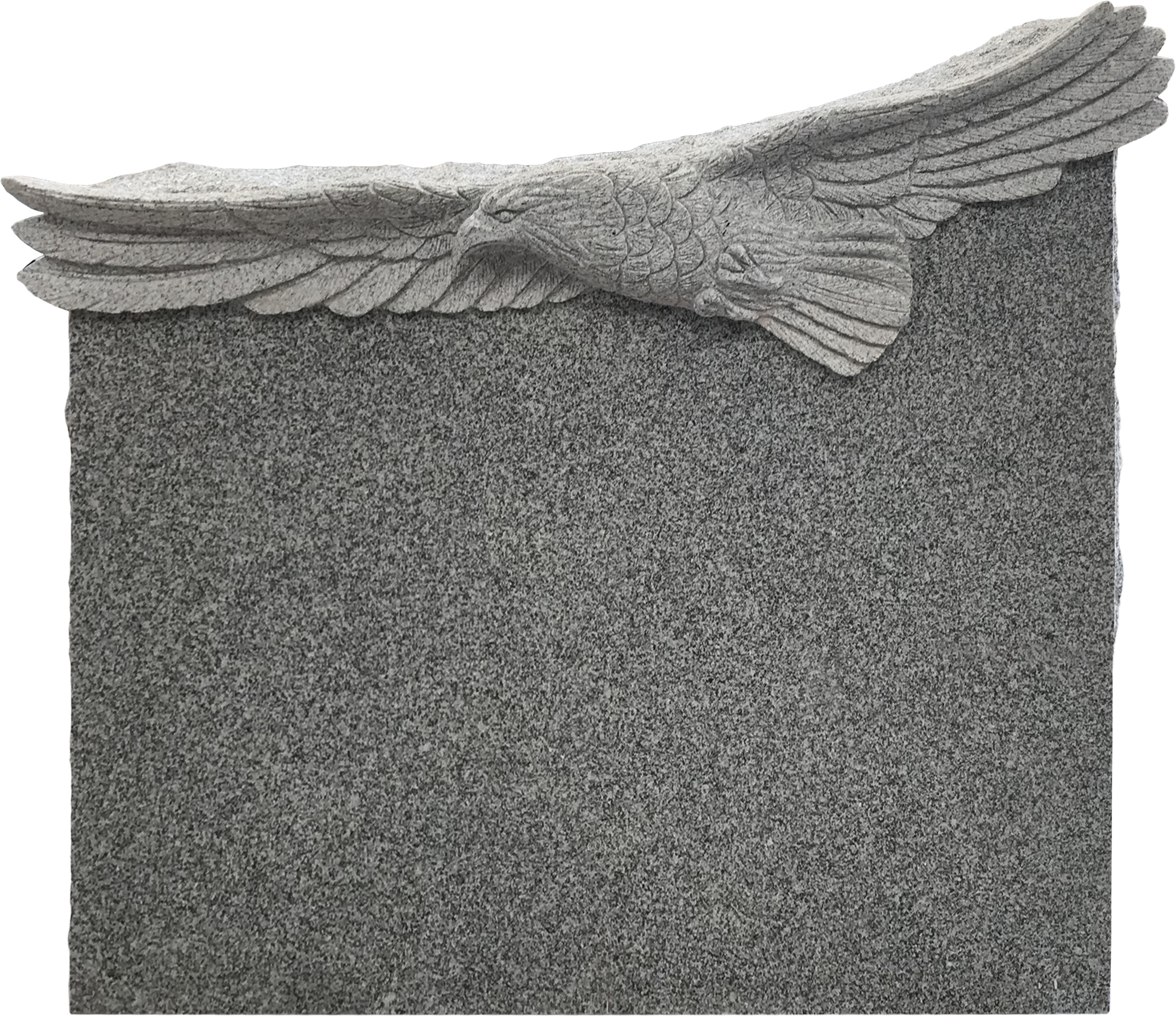 Gray stone memorial with a carved eagle at the top, wings spread, on a textured stone background.