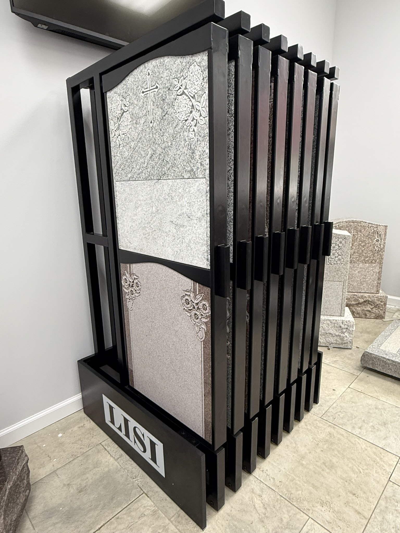 Monument Display Stand showcasing 32 granites in a 3 foot by 3 foot footprint. 