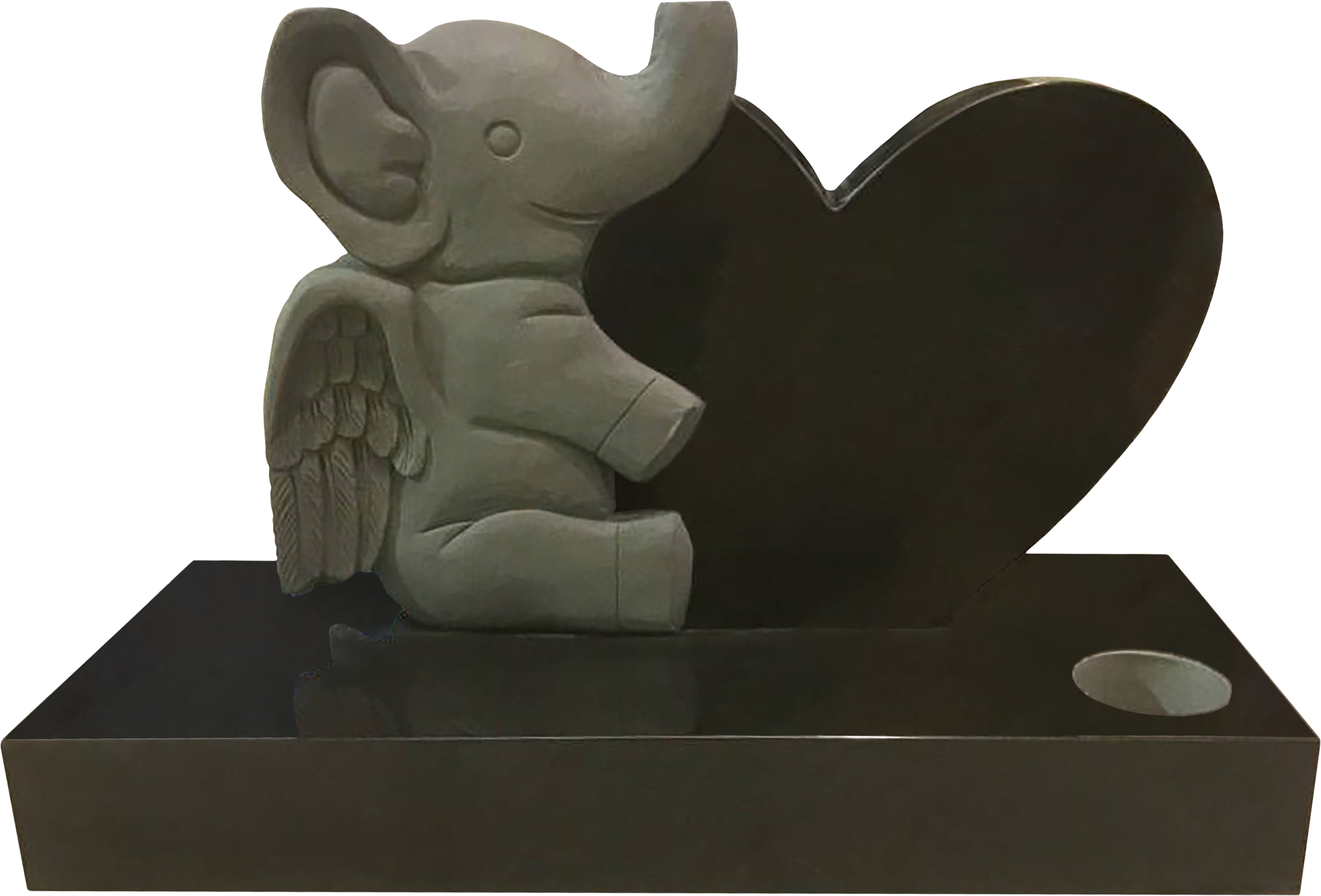 A decorative statue of a cute baby elephant with wings, holding a large heart-shaped object, placed on a rectangular base with a circular hole.