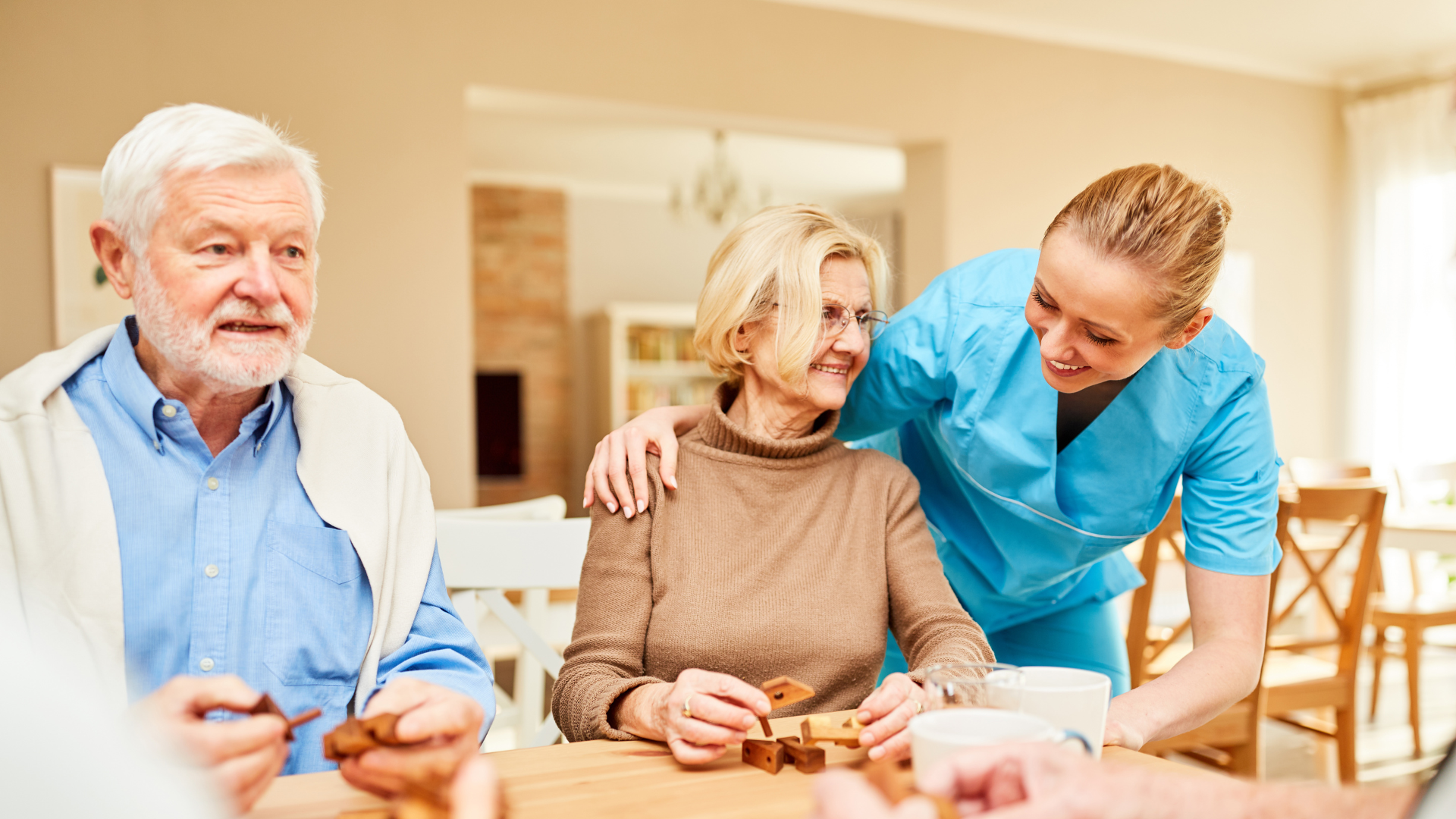 An aide assisting woman