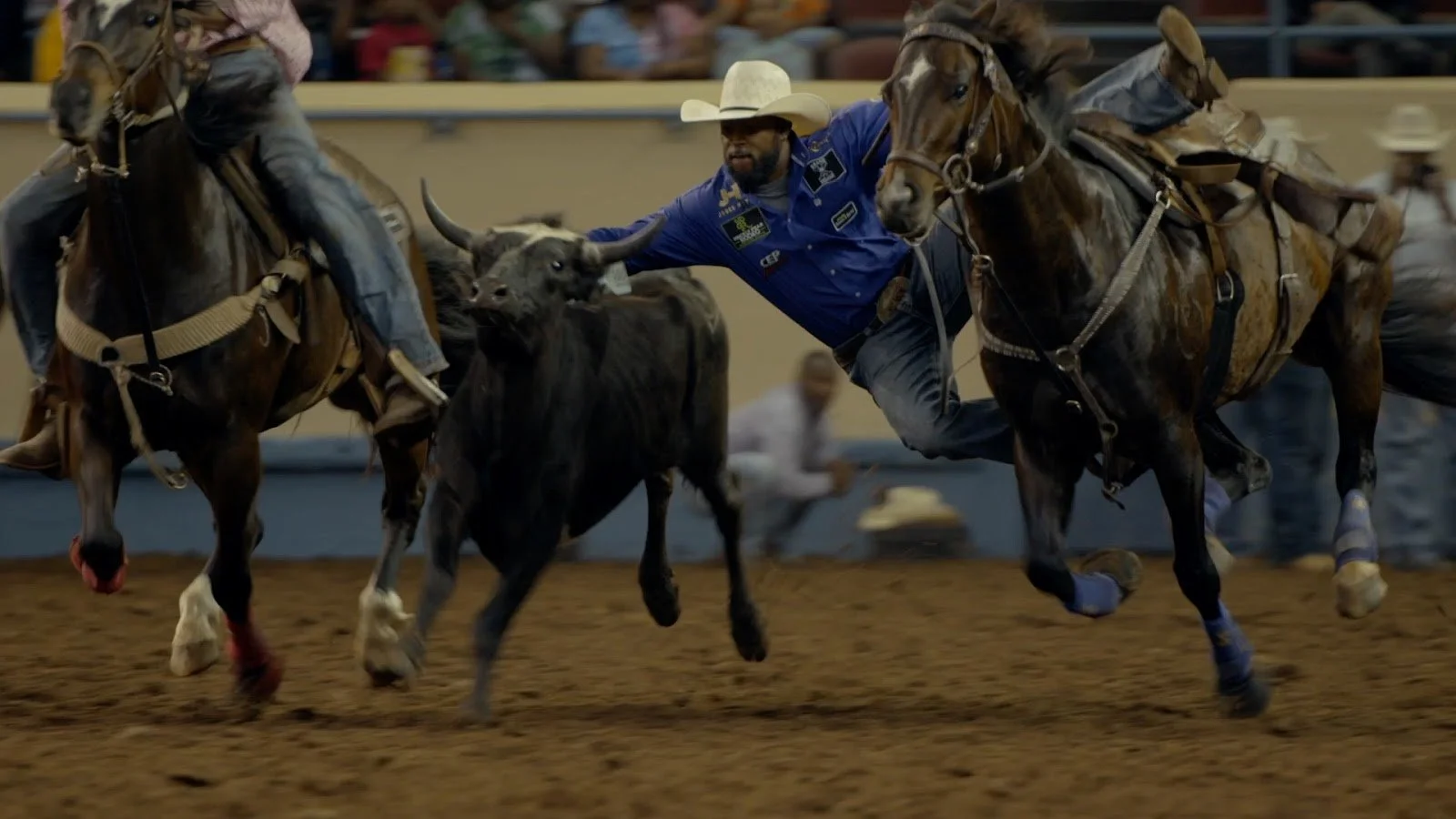 An image of a cowboy participating in a rodeo.