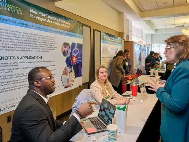 Chinedum and Dr. Rachel at the MSU's innovation celebration ceremony presenting on our novel RNA therapeutics for aggressive prostate cancers.