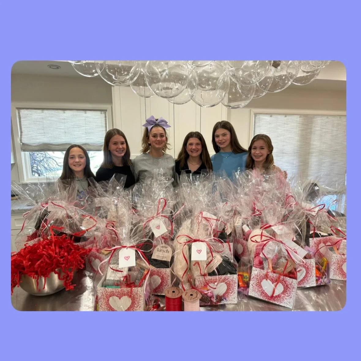 We are getting ready for heart month around here! 

This afternoon this SWEET group of girls assembled 30 care baskets for heart moms in the hospital we will give out in February. They were filled with hair items, fuzzy socks, slippers, chocolates an