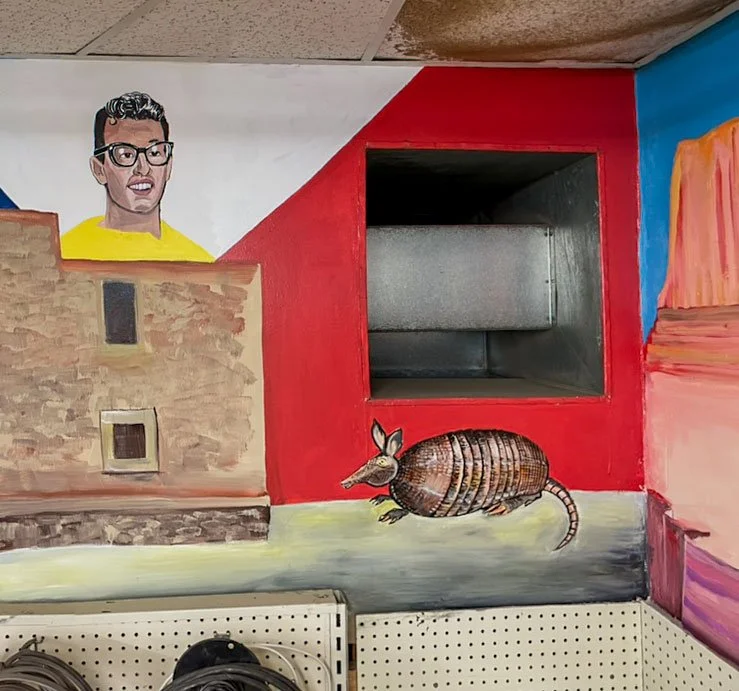 Part of Alamo on left side, Buddy Holly above, with armadillo on bottom right side