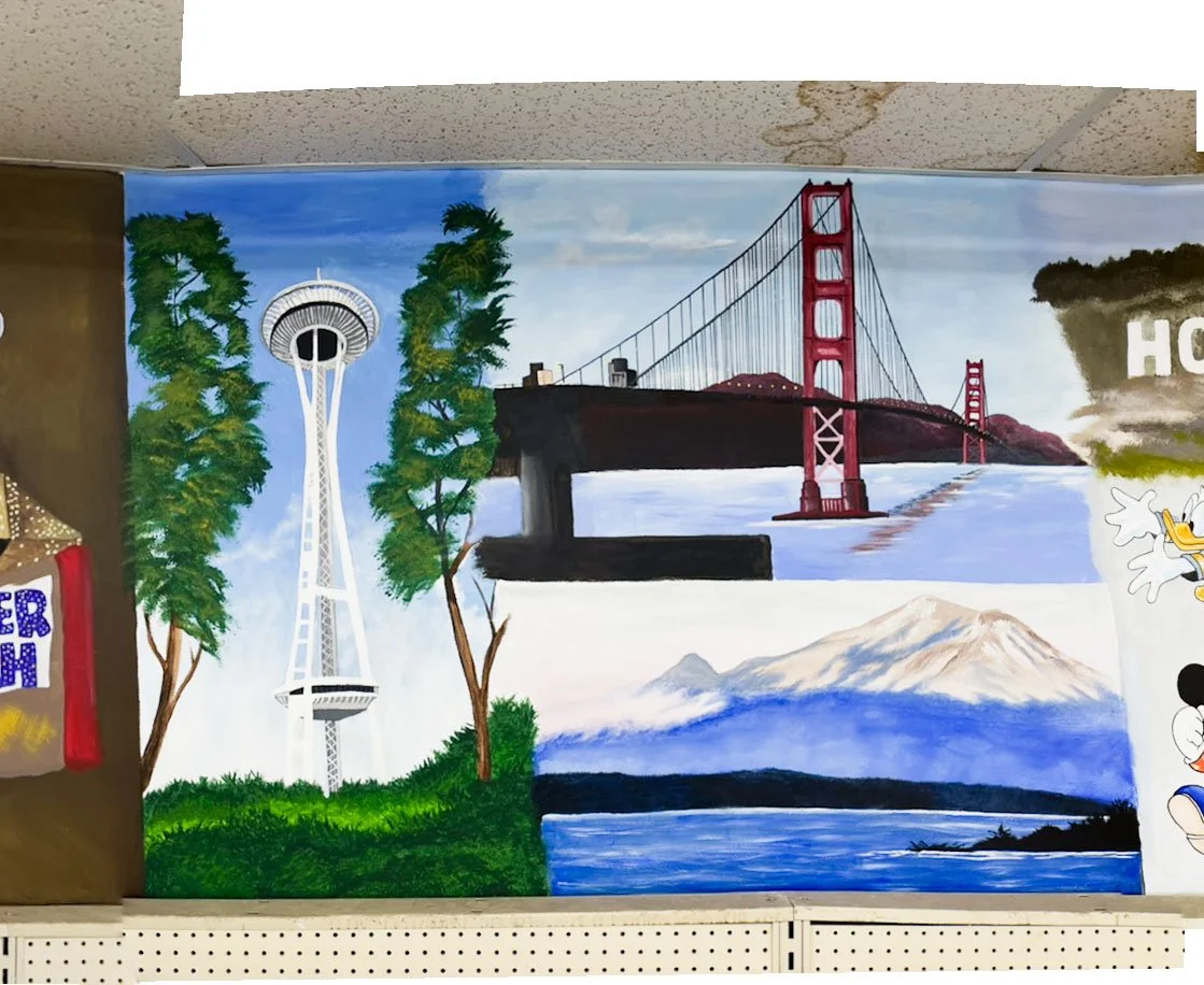 Space Needle on left, Golden Gate Bridge top center, Mt. Rainer bottom center, part of Hollywood sign on right edge