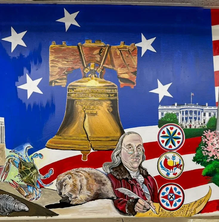 A crab, beaver, Benjamin Franklin signing Declaration of Independence, Liberty Bell, and White House in front of American Flag background