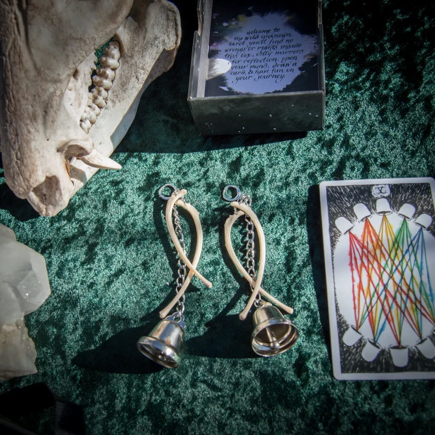 Ten of cups⭐☕

These hangers are perfect for those with &quot;regular&quot; or stretched ear holes. They're made lovingly with domestic cat ribs and recycled bells. These earrings are talismans for celebration. Find sacred play in your life and grati