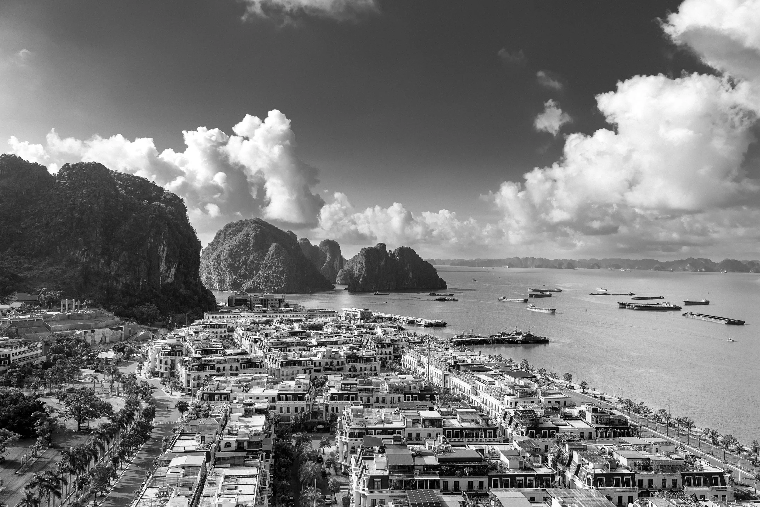 An amazing view of Ha Long City, nestled against Ha Long Bay, as viewed from an apartment high-rise building.
