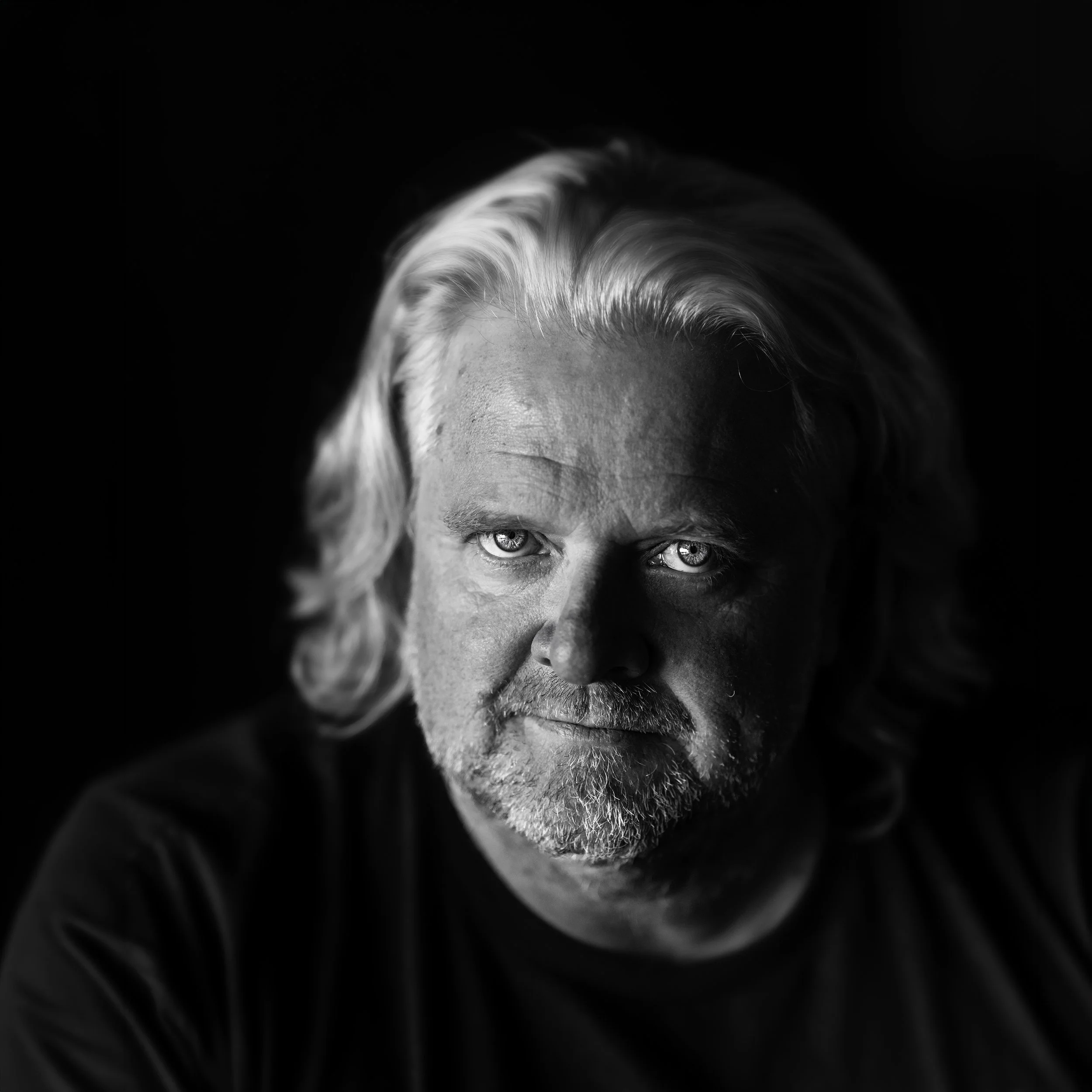 Black and white portrait of Australian wine marketer and businessman Howard Duncan, by Campbell Mattinson.