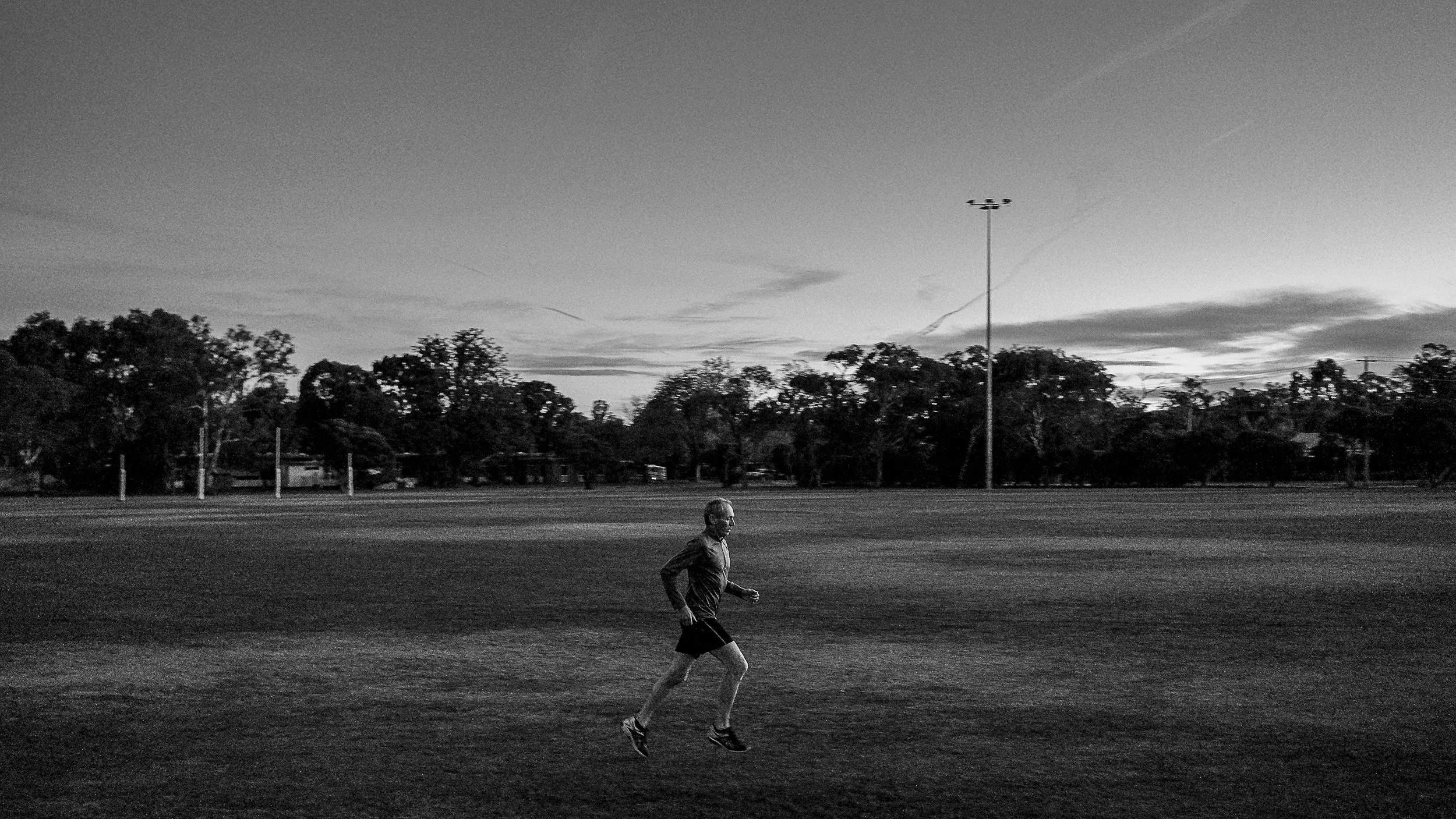 Runner at football oval in Wangaratta.