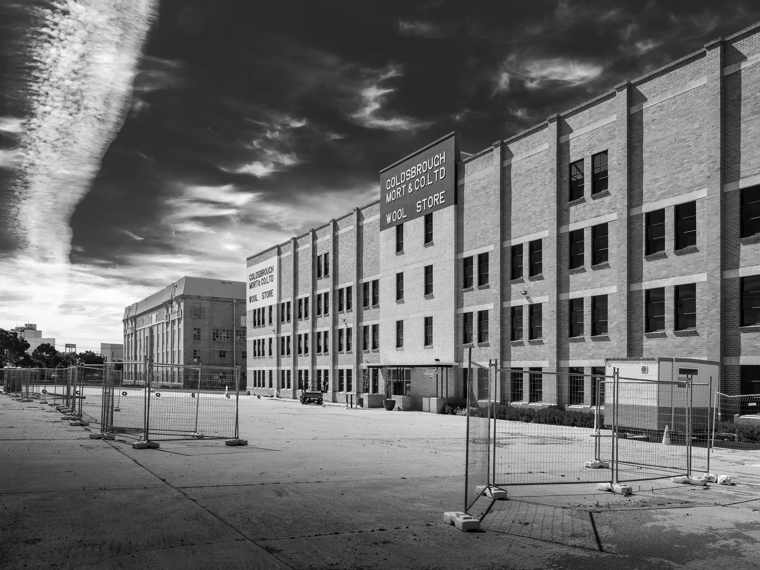 Fences guard the Goldsbrough Mort Co Wool Store on Sunshine Road, West Footscray, in 2026.