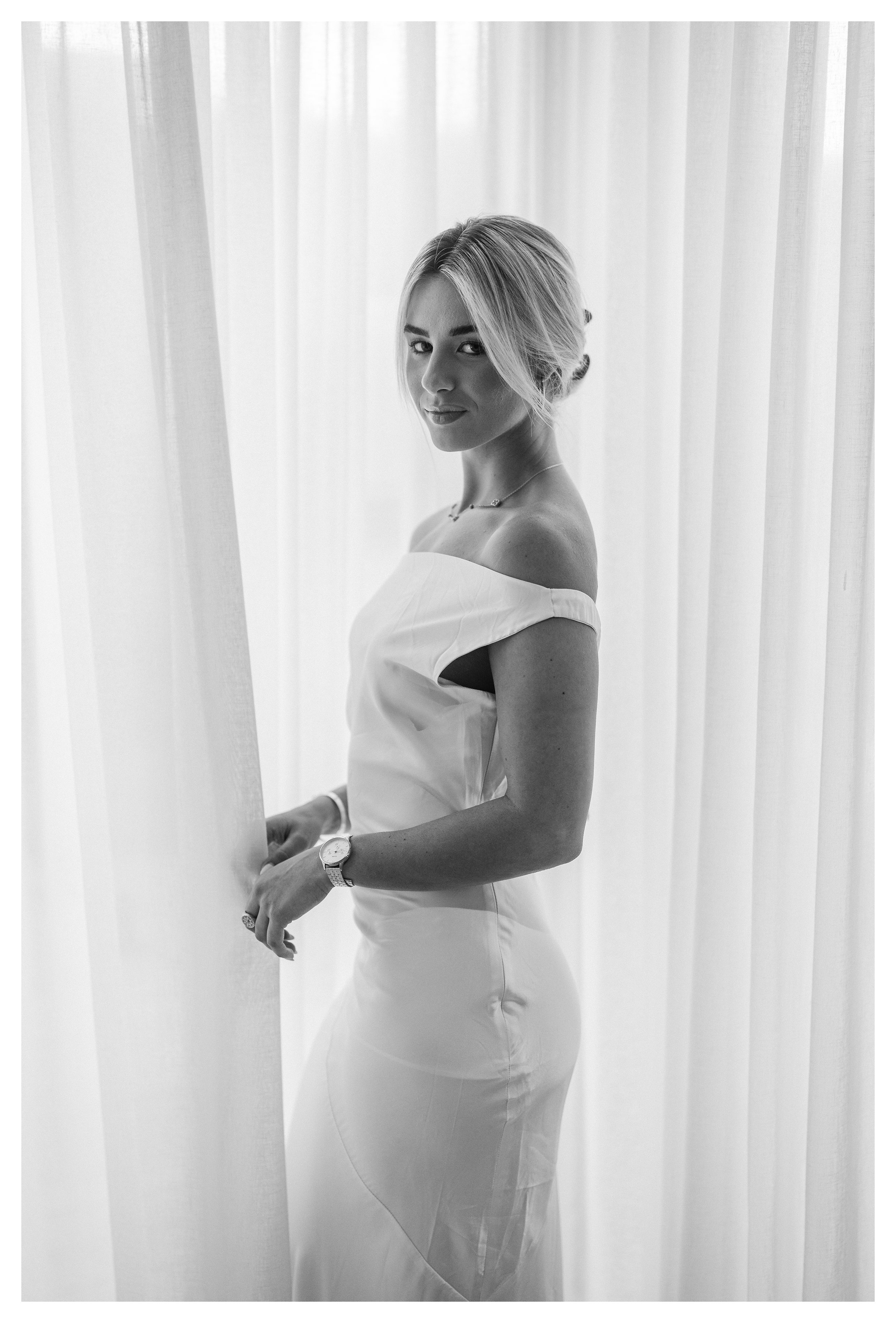 Model Shanelle Hodgkinson in a beatiful white dress. Photography is copyright Campbell Mattinson.