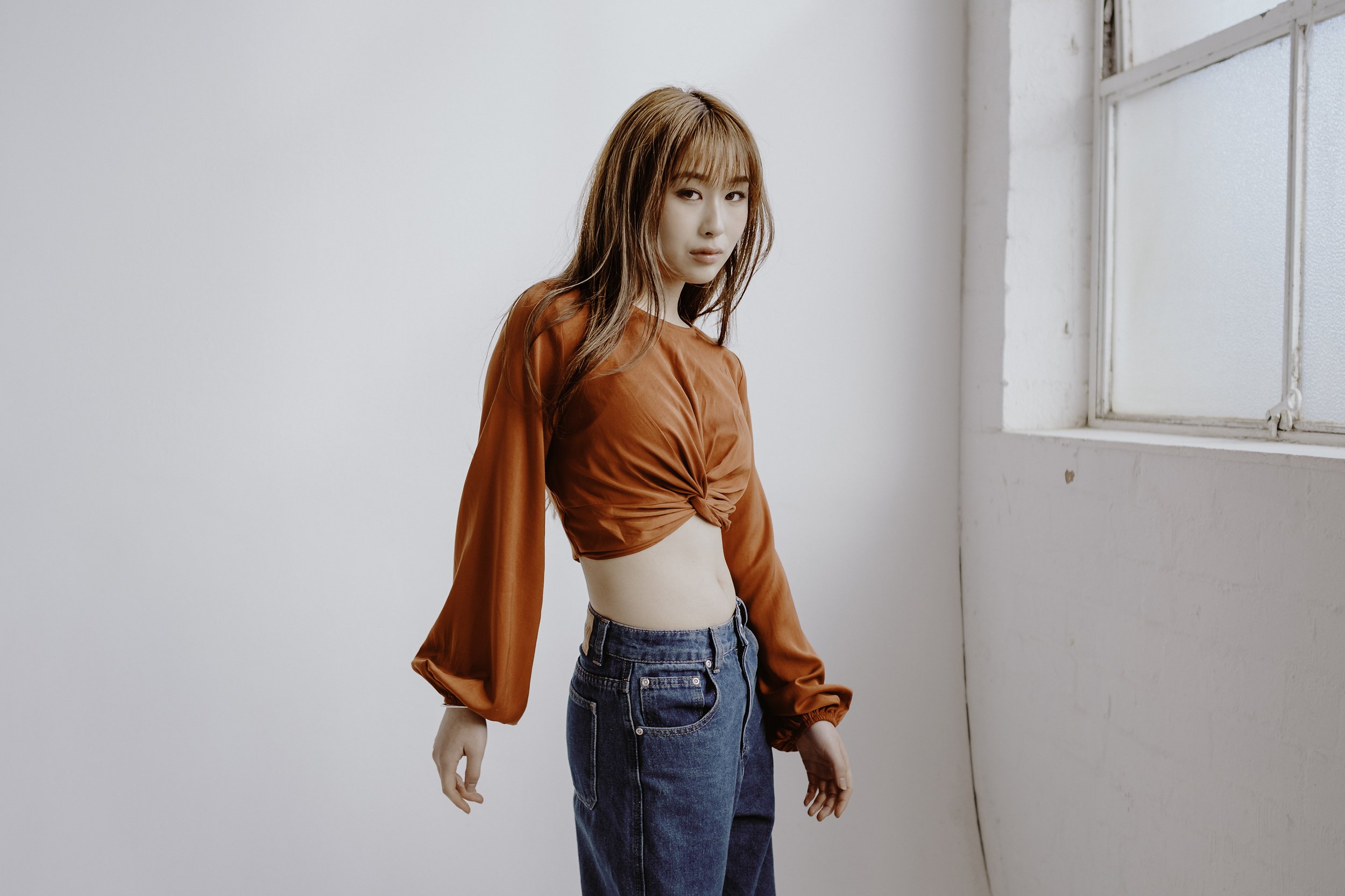 Portrait of Andrea Djou by Campbell Mattinson.