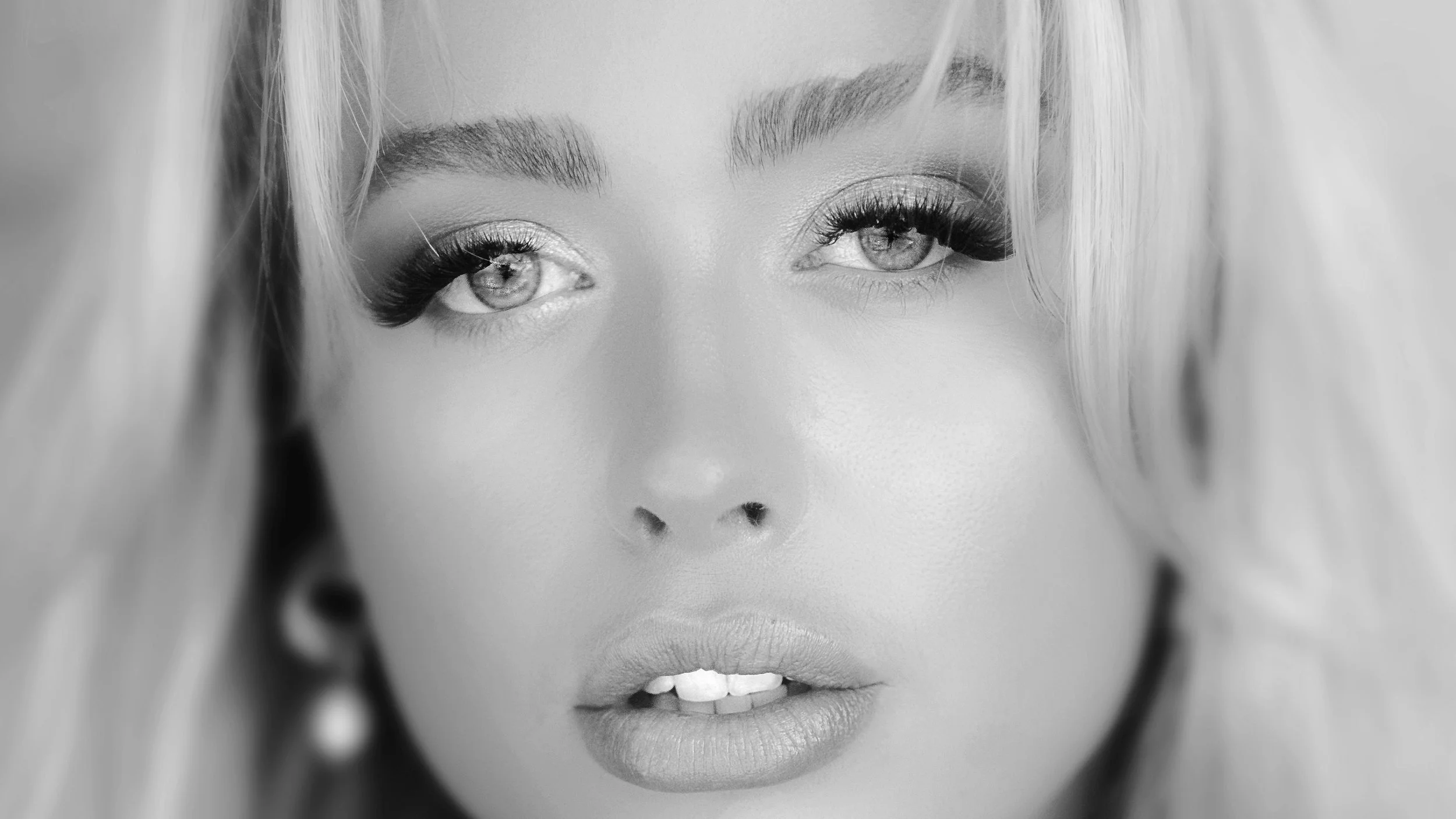 Extreme close-up image of blonde-haired Melbourne model and Instagram influencer Hollie Elizabeth.