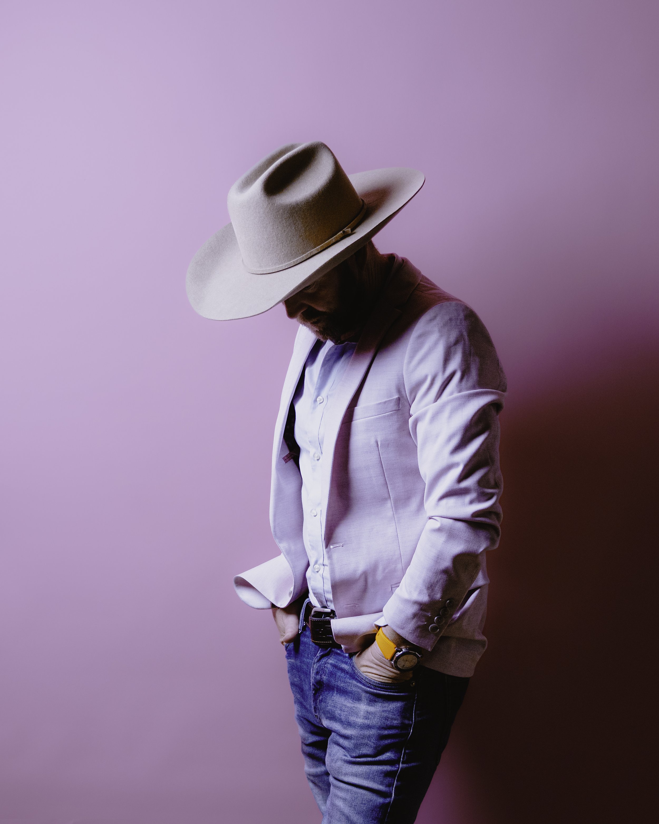 Photographer and writer Campbell Mattinson, wearing a cowboy hat, taken in 2026.