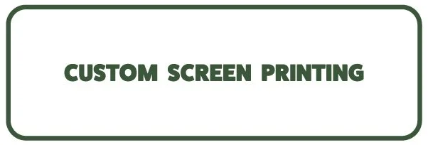 Sign with green border and text that reads 'Custom Screen Printing'.