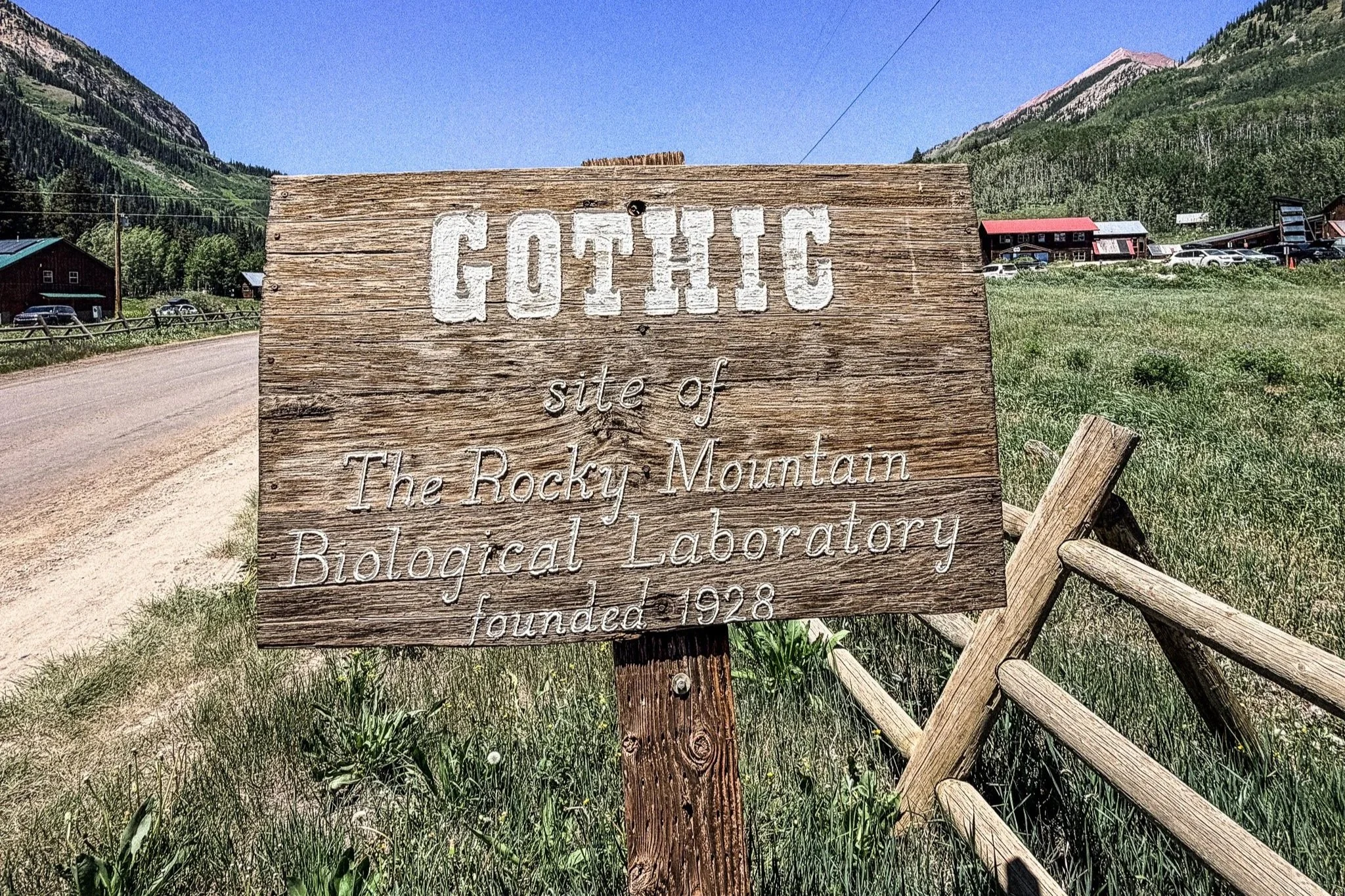 Wooden Gothic sign marking the site of the Rocky Mountain Biological Laboratory near Crested Butte, Colorado.