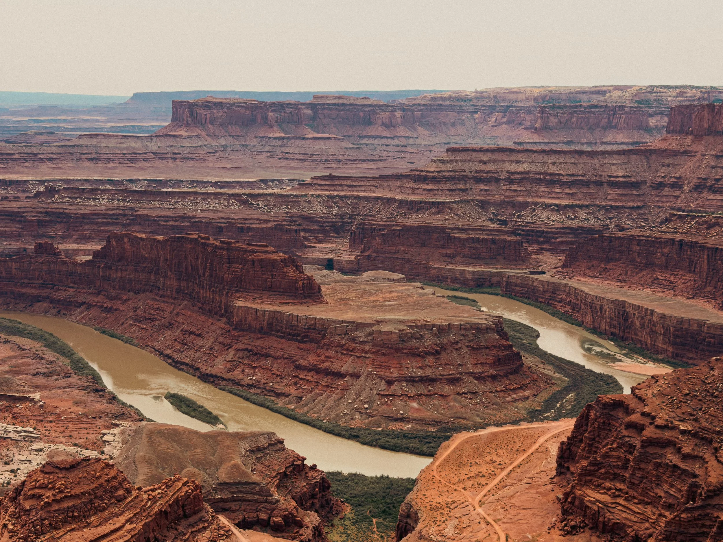 Colorado River carving through layered canyon landscape at Dead Horse Point State Park Utah