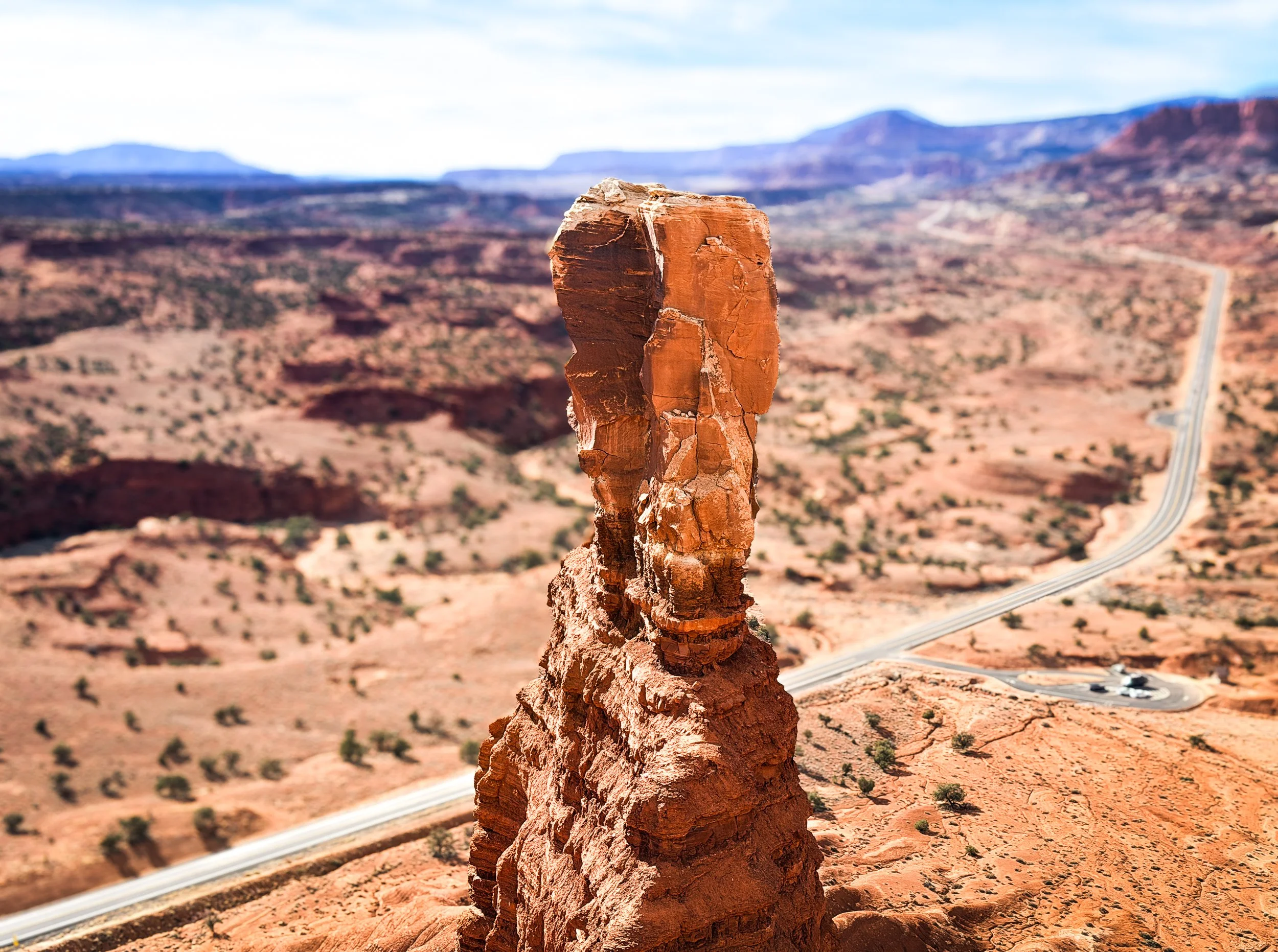 Chimney Rock formation overlooking the desert landscape in Capitol Reef National Park Utah.