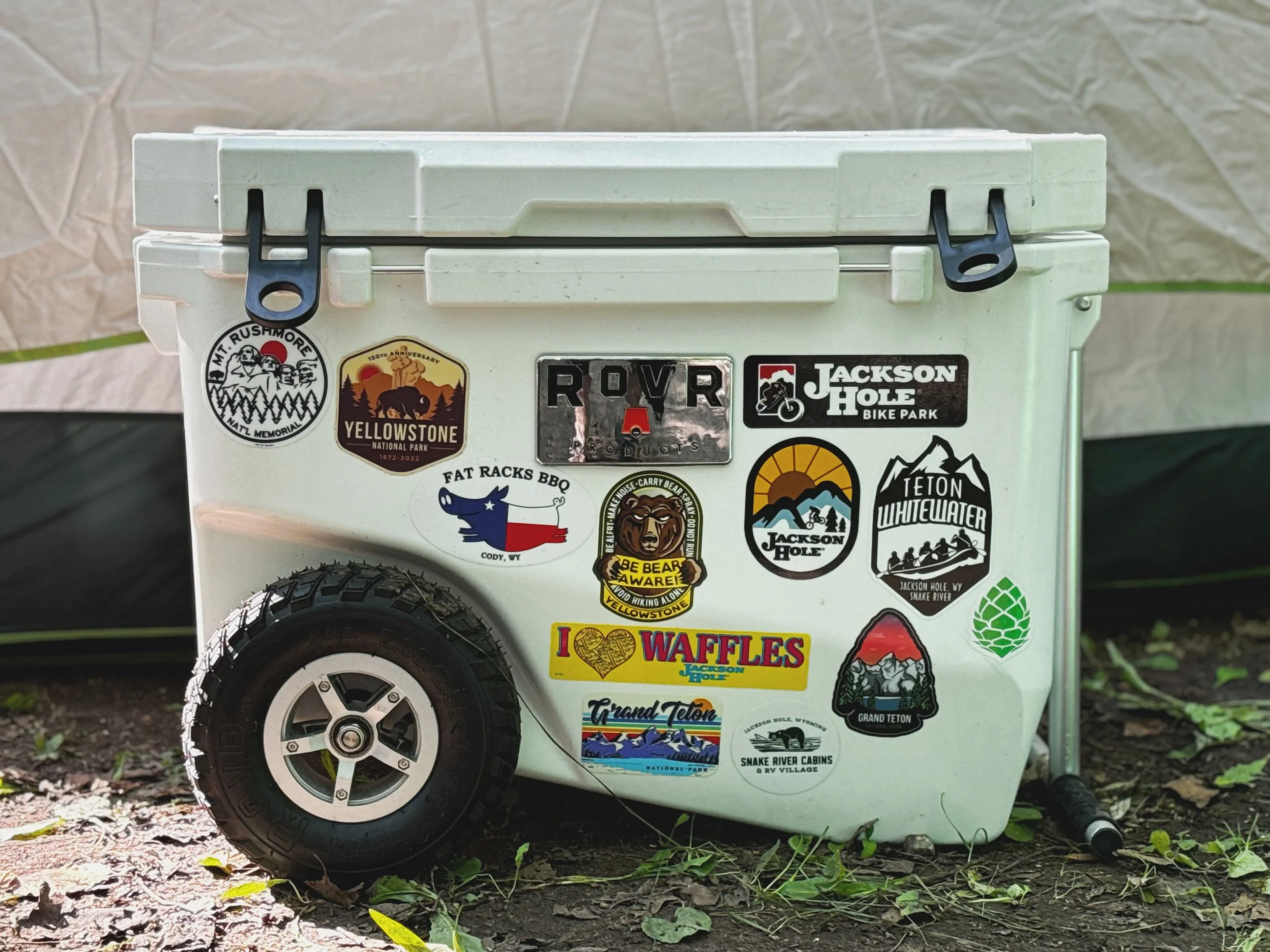 RovR RollR 60 wheeled cooler used for camping.