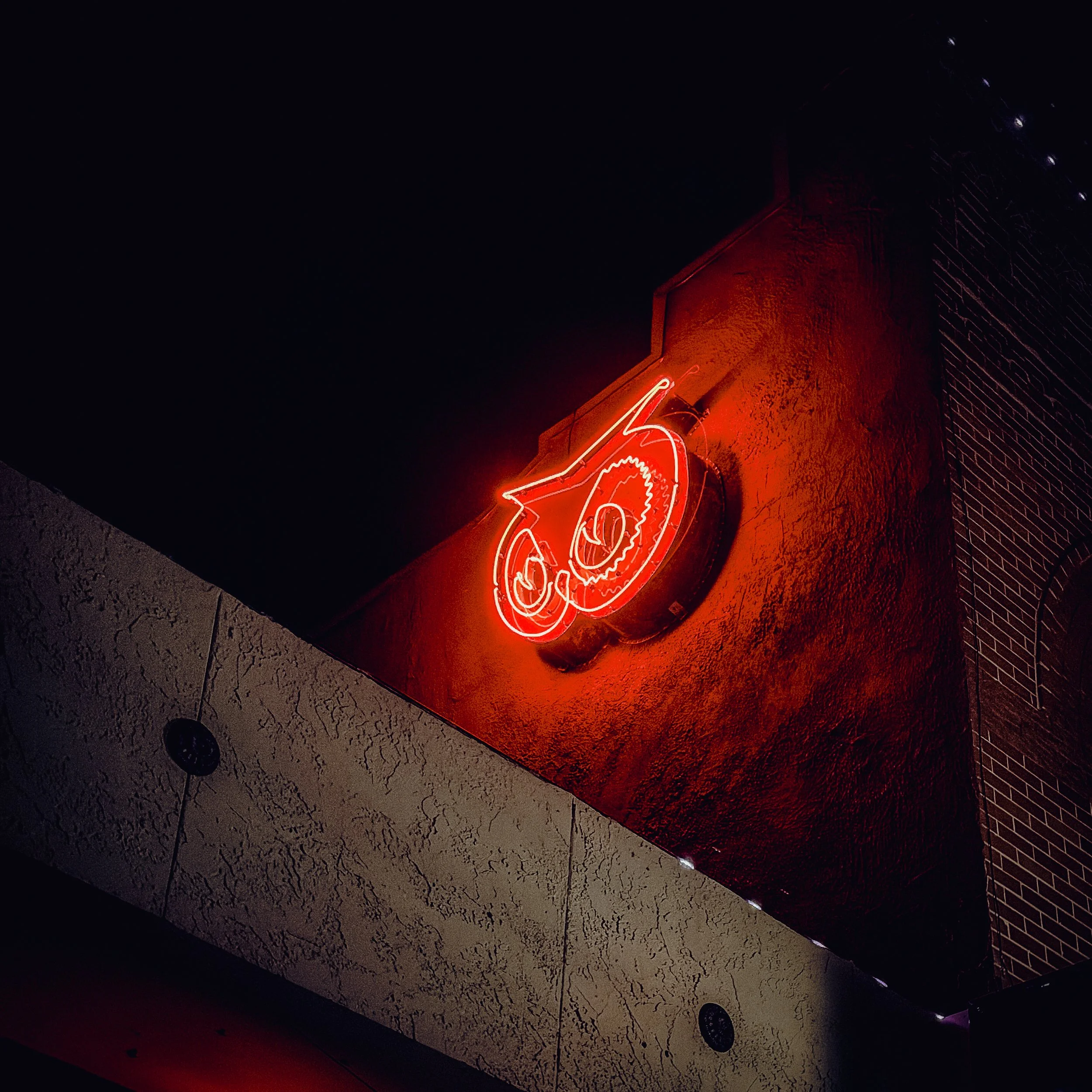 Owl neon sign along the A Street Promenade