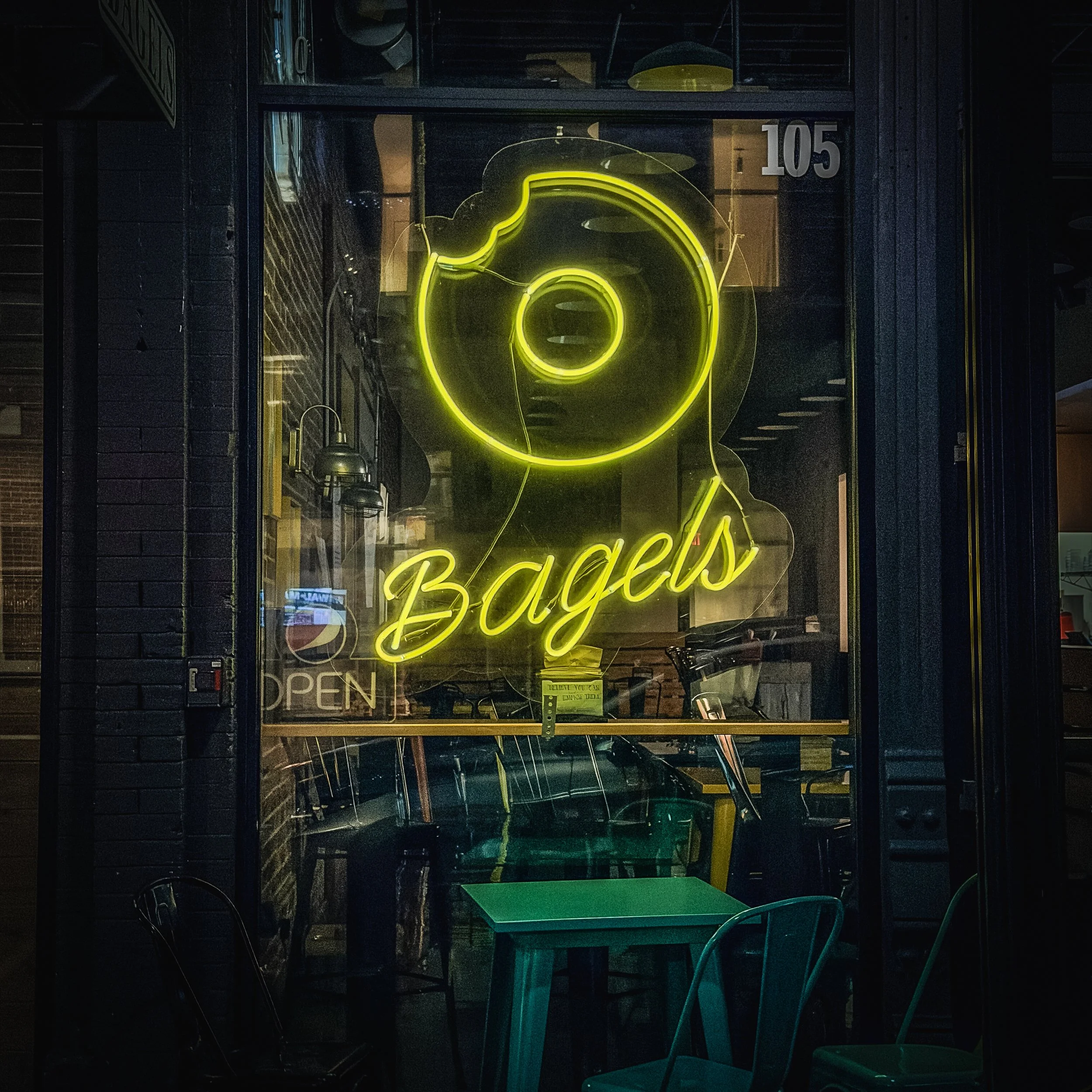 Neon bagel sign at Ozark Mountain Bagel Company