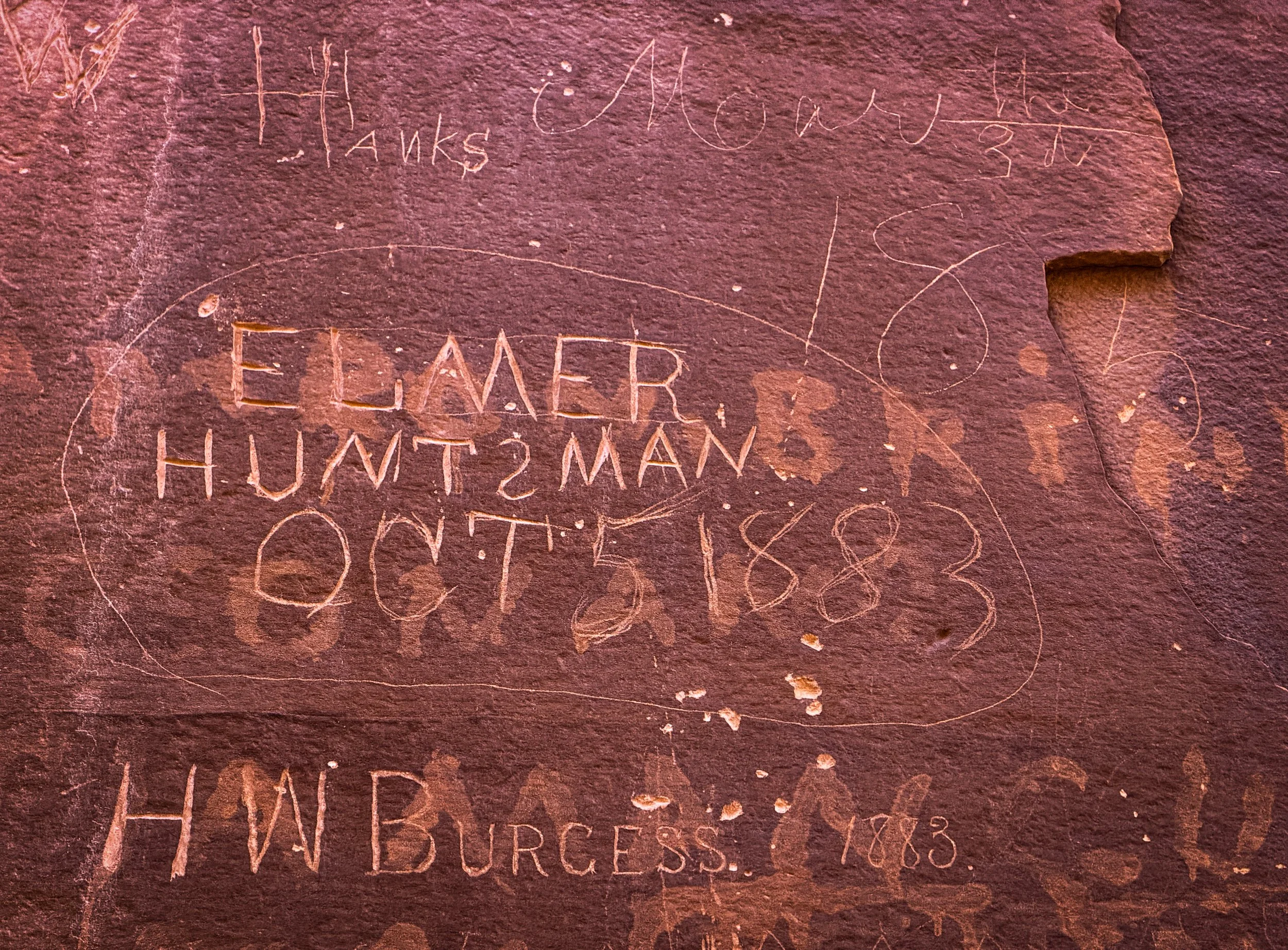 Pioneer Register carved names in sandstone wall along Capitol Gorge Trail in Capitol Reef National Park