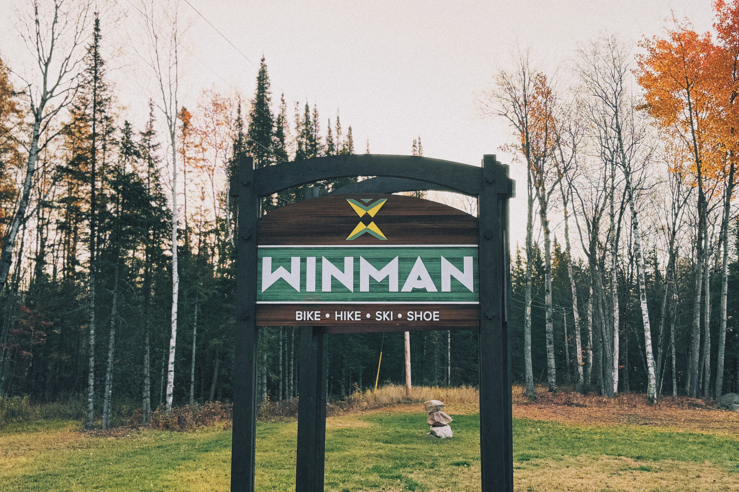 WinMan Trails entrance sign near Winchester, Wisconsin, with forest background.
