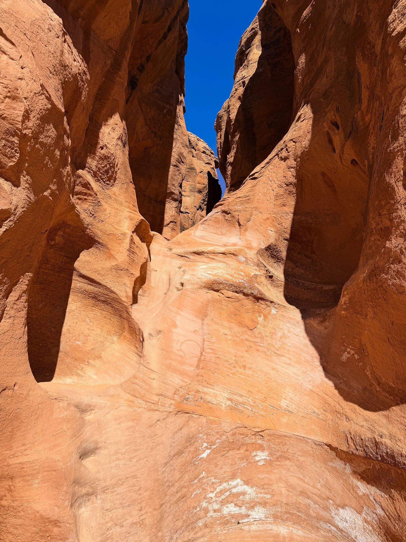 Steep sandstone climb into Peek a Boo slot canyon in Grand Staircase Escalante National Monument