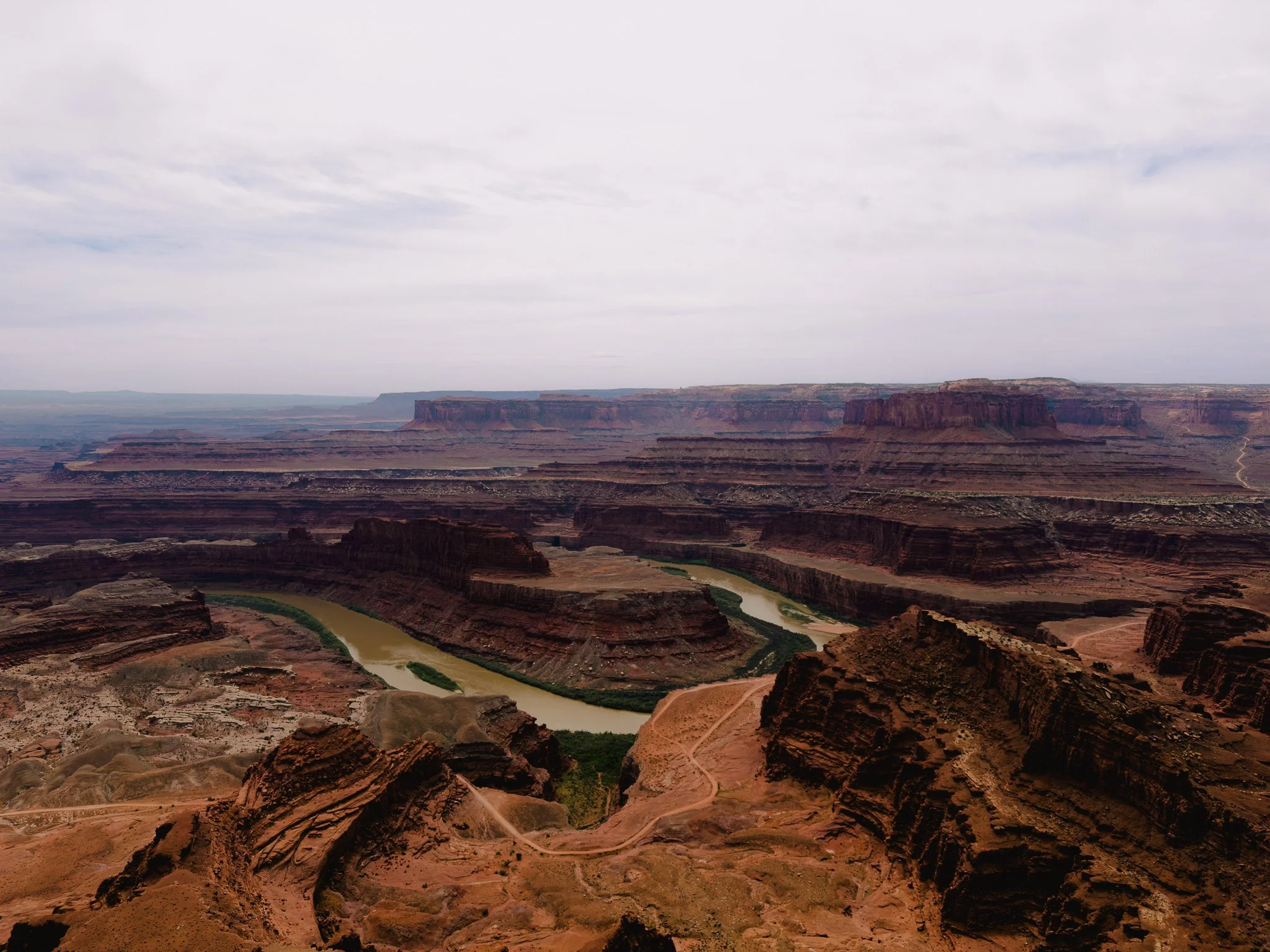 View from Dead Horse Point State Park overlooking the Colorado River and canyon landscape near Shafer Trail in Utah.