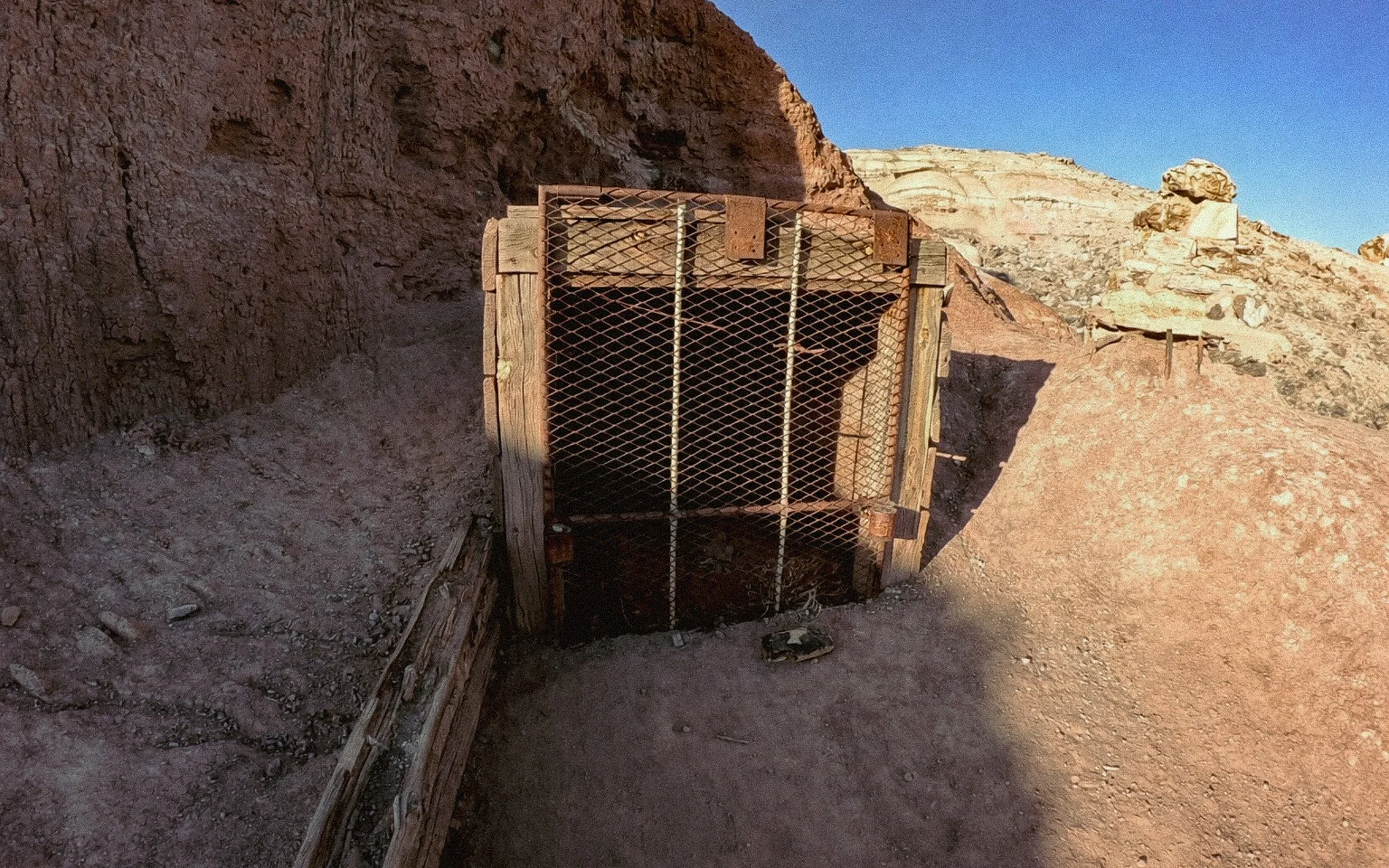 Fenced fossil quarry at Dinosaur Hill in Fruita where Elmer Riggs excavated a sauropod skeleton in 1901.