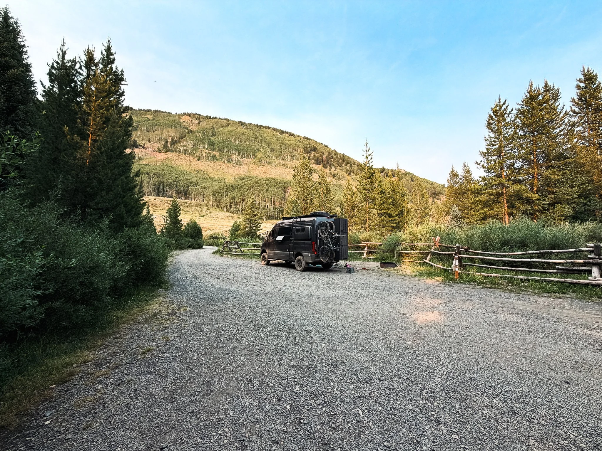 Sprinter van parked at a campsite at Oh Be Joyful Campground near Crested Butte, Colorado.