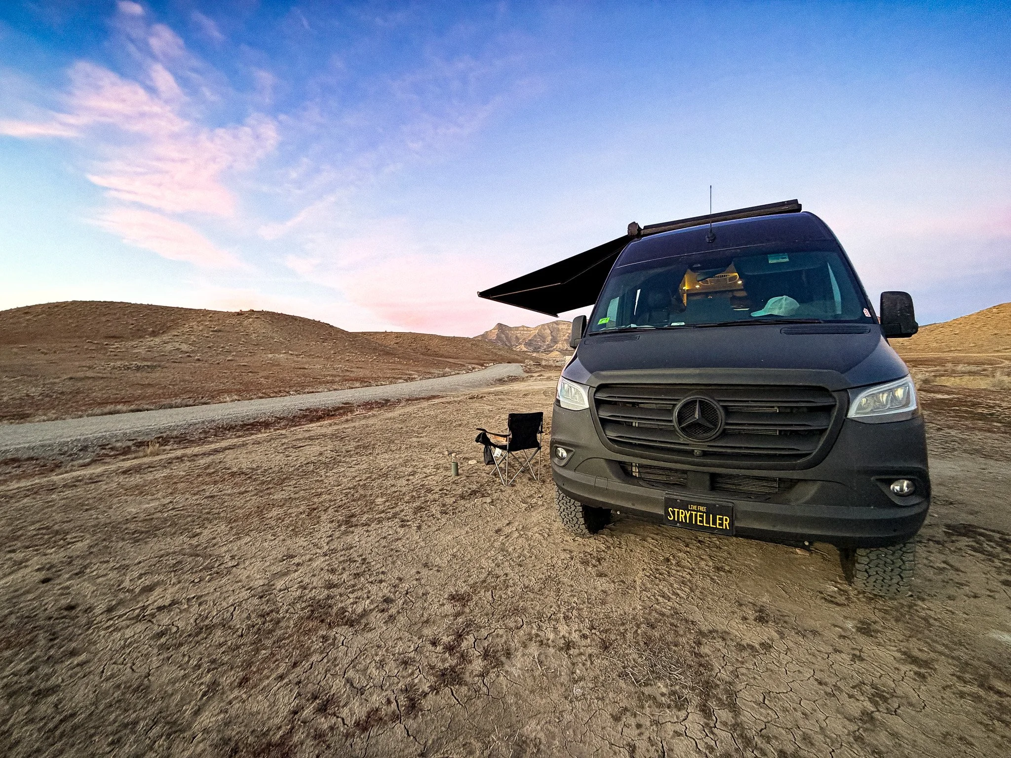 camper van parked at dispersed camping near 18 road trails in Fruita Colorado at sunset