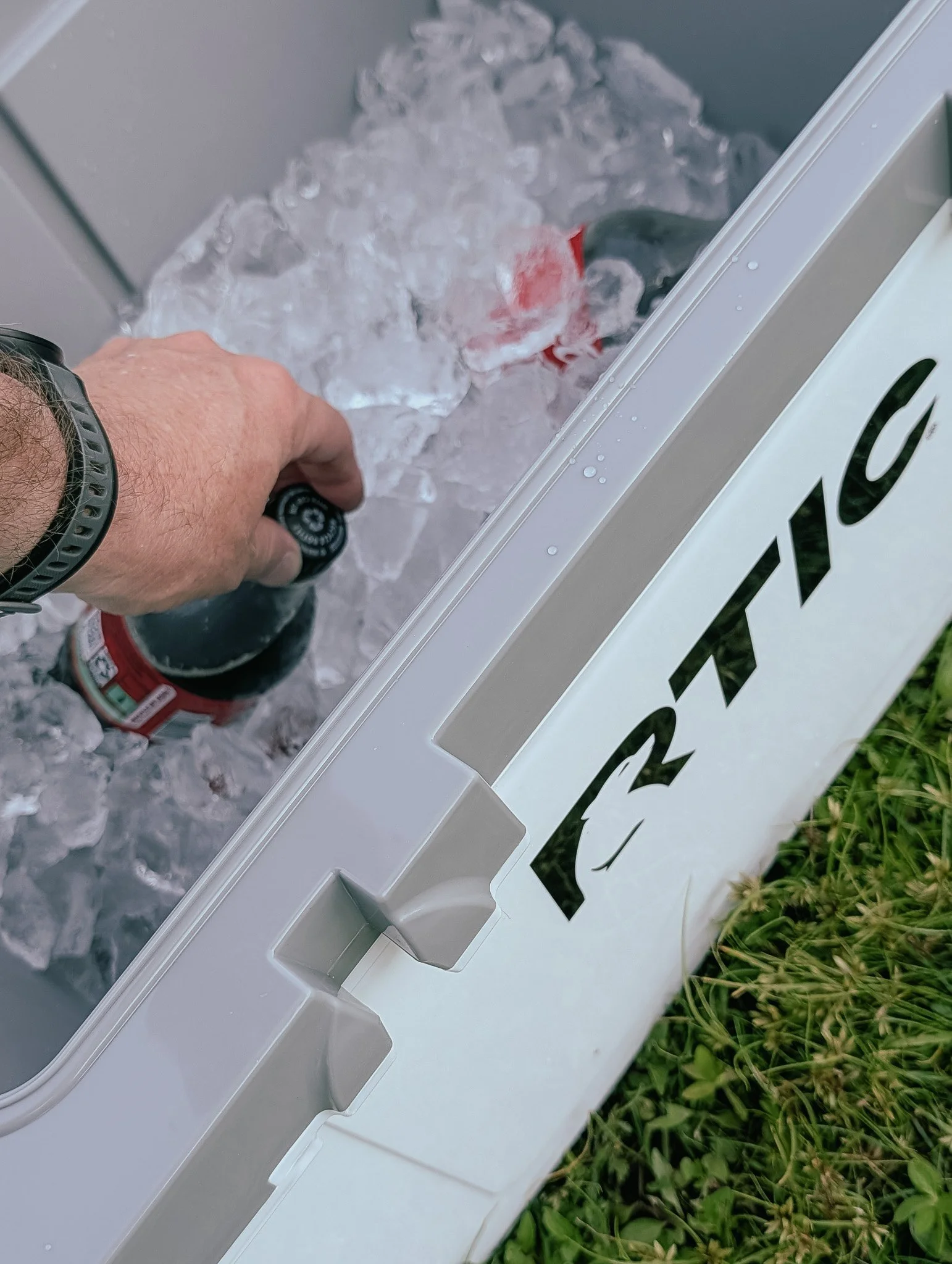 RTIC 32 QT Ultra-Light Cooler filled with ice and drinks at the lake.