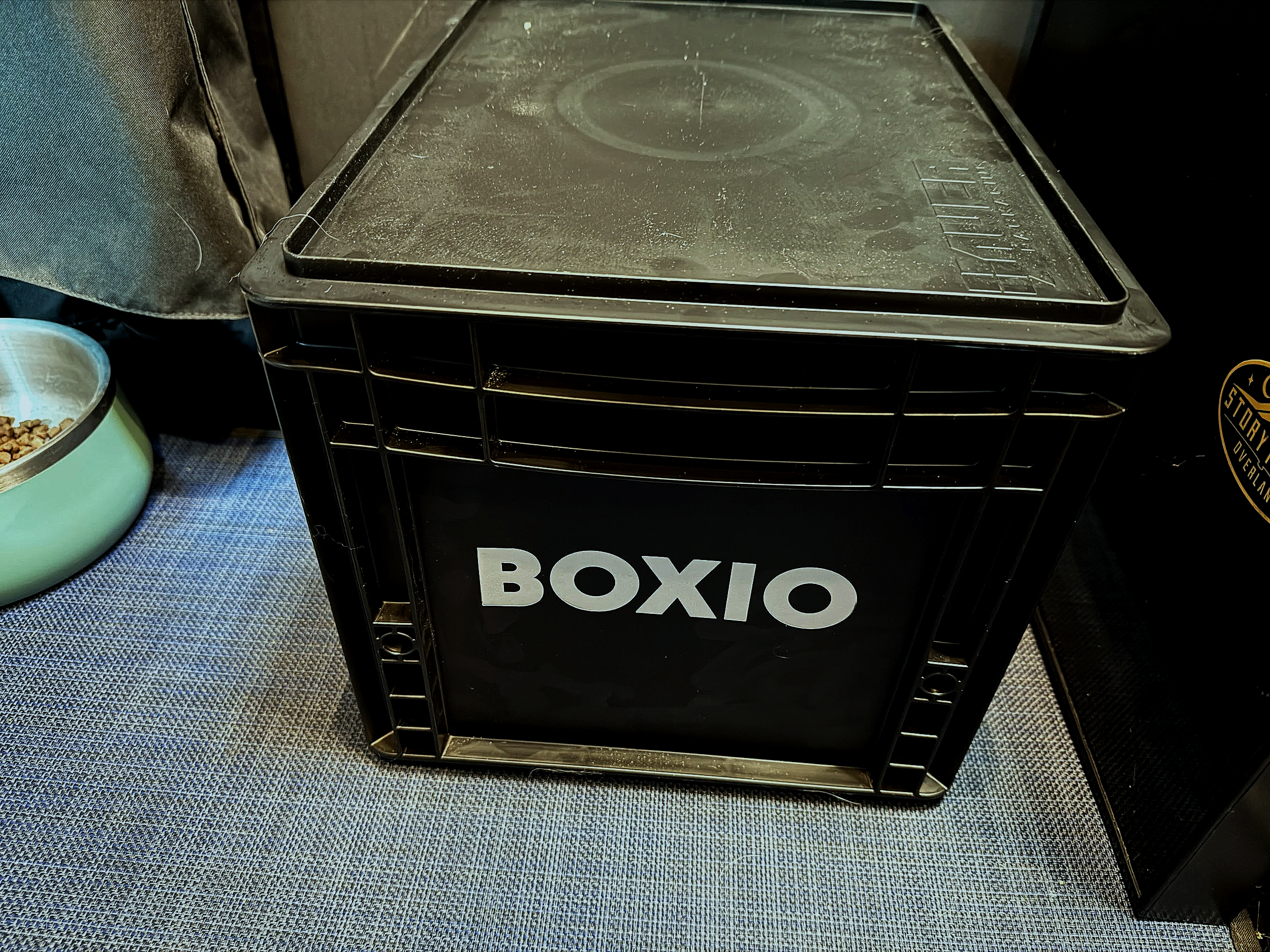 BOXIO portable toilet stored inside a van life setup