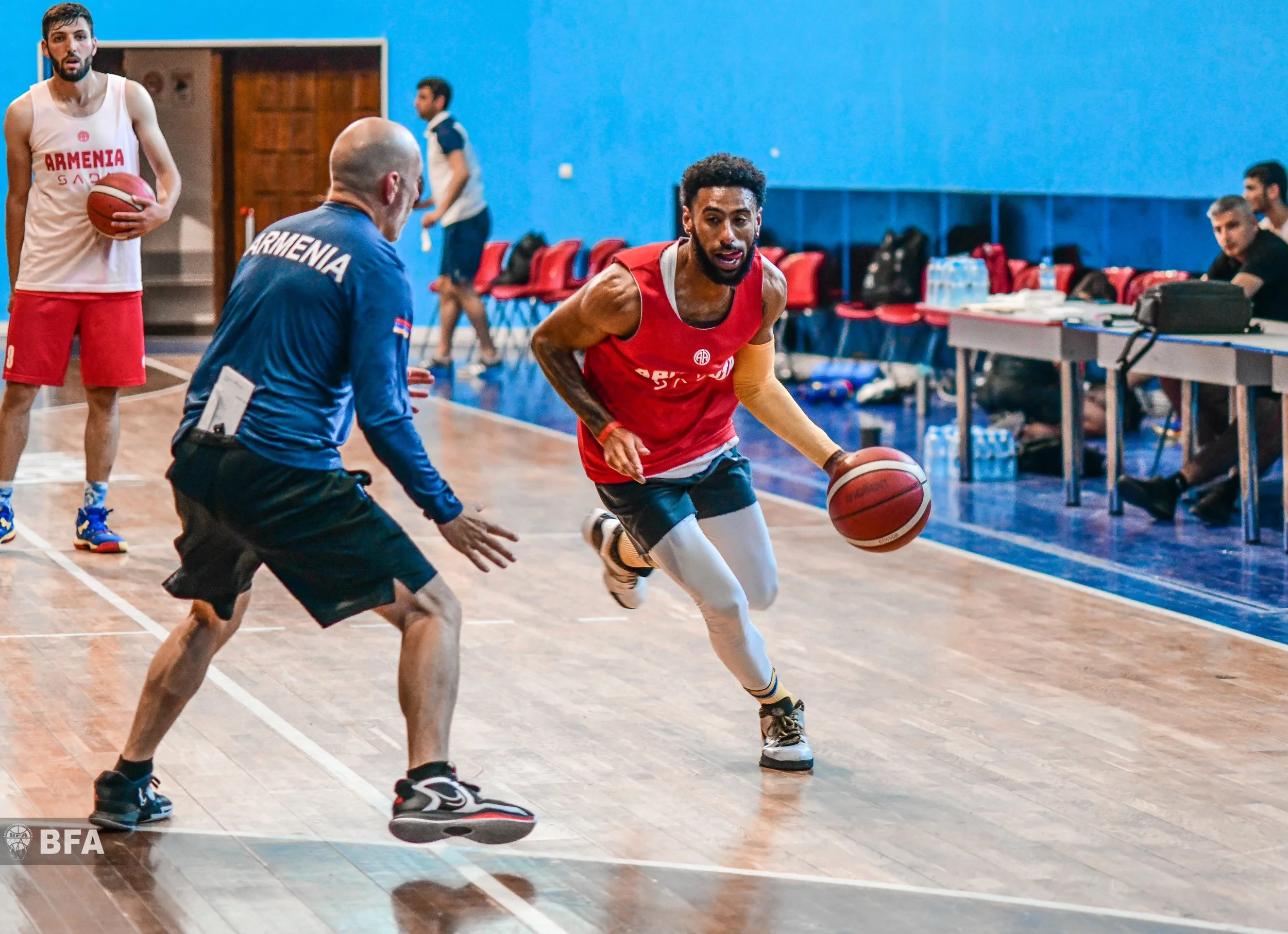 Basketball players in a gym during practice