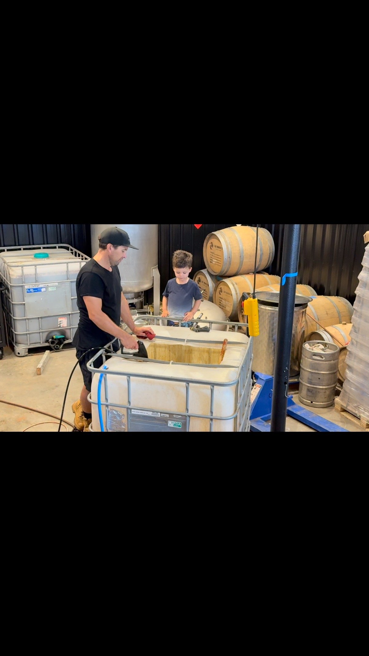 Rum in the making… with our trusty apprentice always keen to learn (and lend a hand—when it’s safe to do so).
This stage is all about giving the molasses a solid stir to kick off the next rum run. It’s where it all begins: m