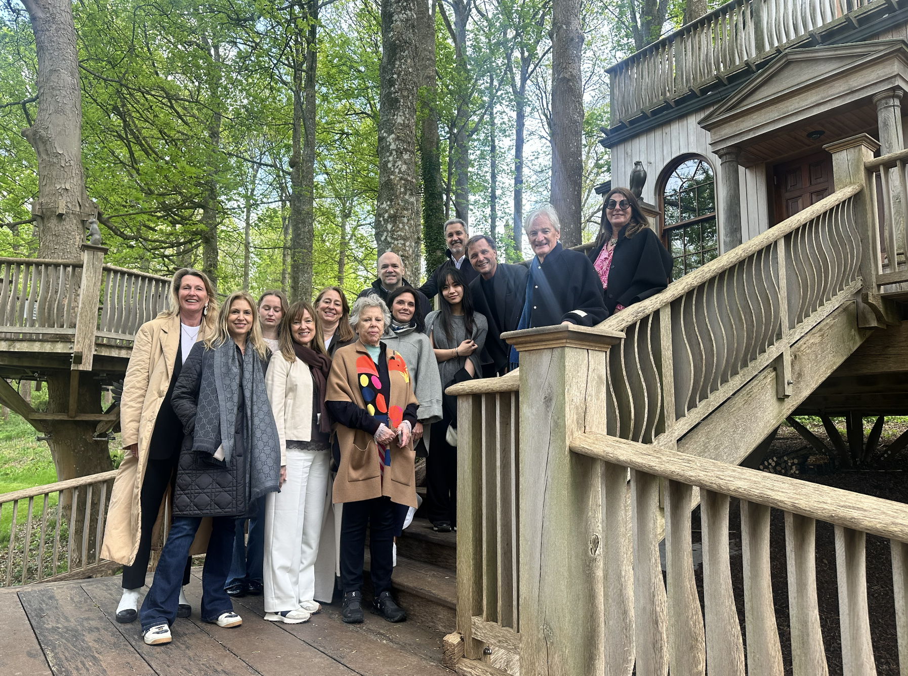 Our group on the steps of the tree house 