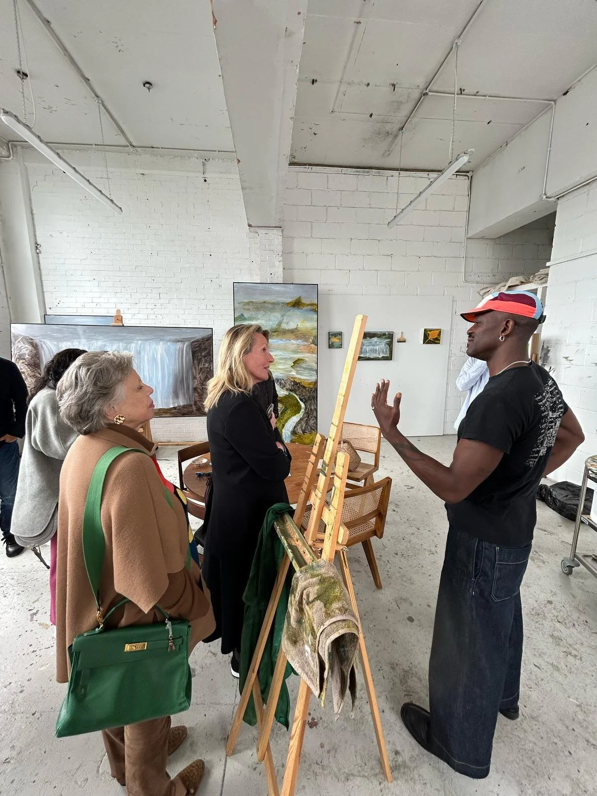 Jamiu presenting his new work