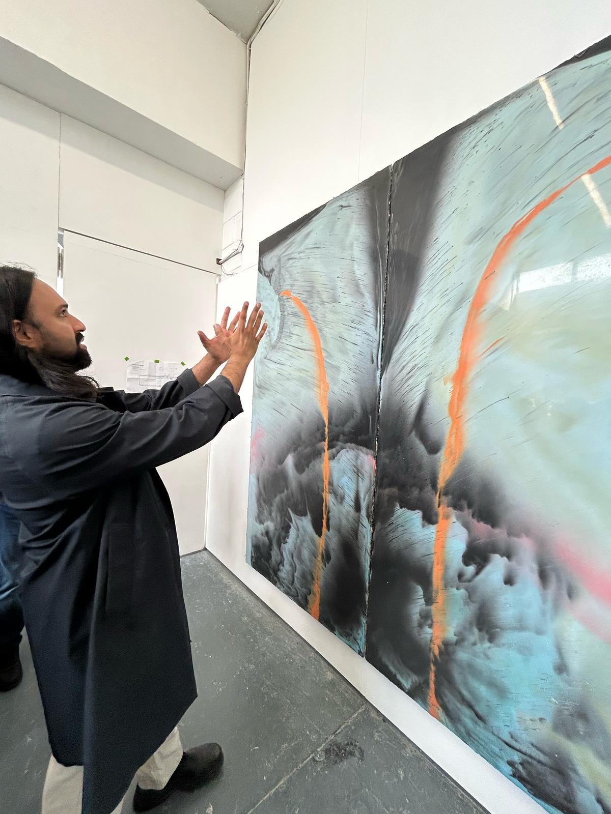 Harminder Judge explaining his work 