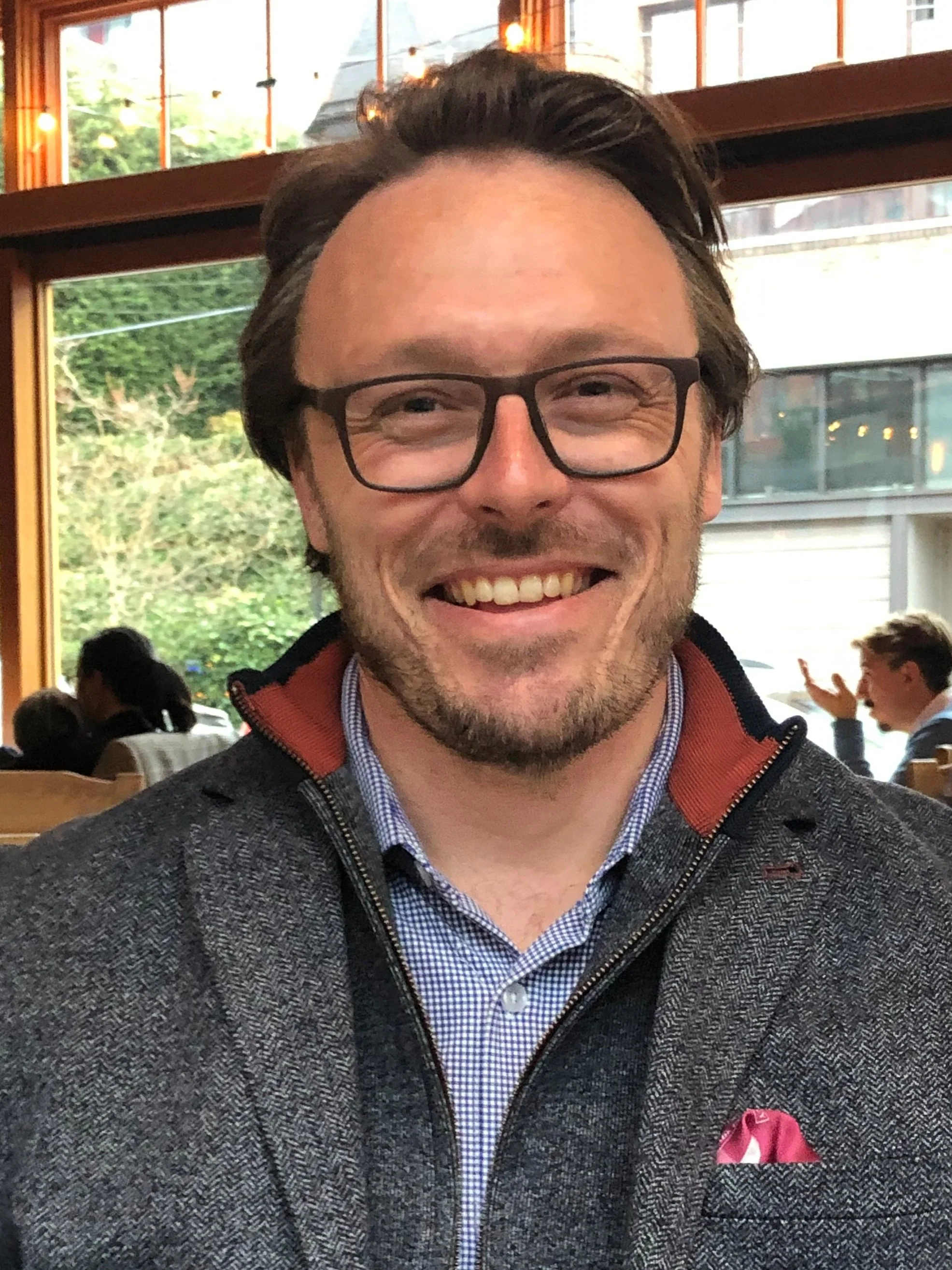 A portrait of founder and ceo of SKY FOLK, Will Waltz