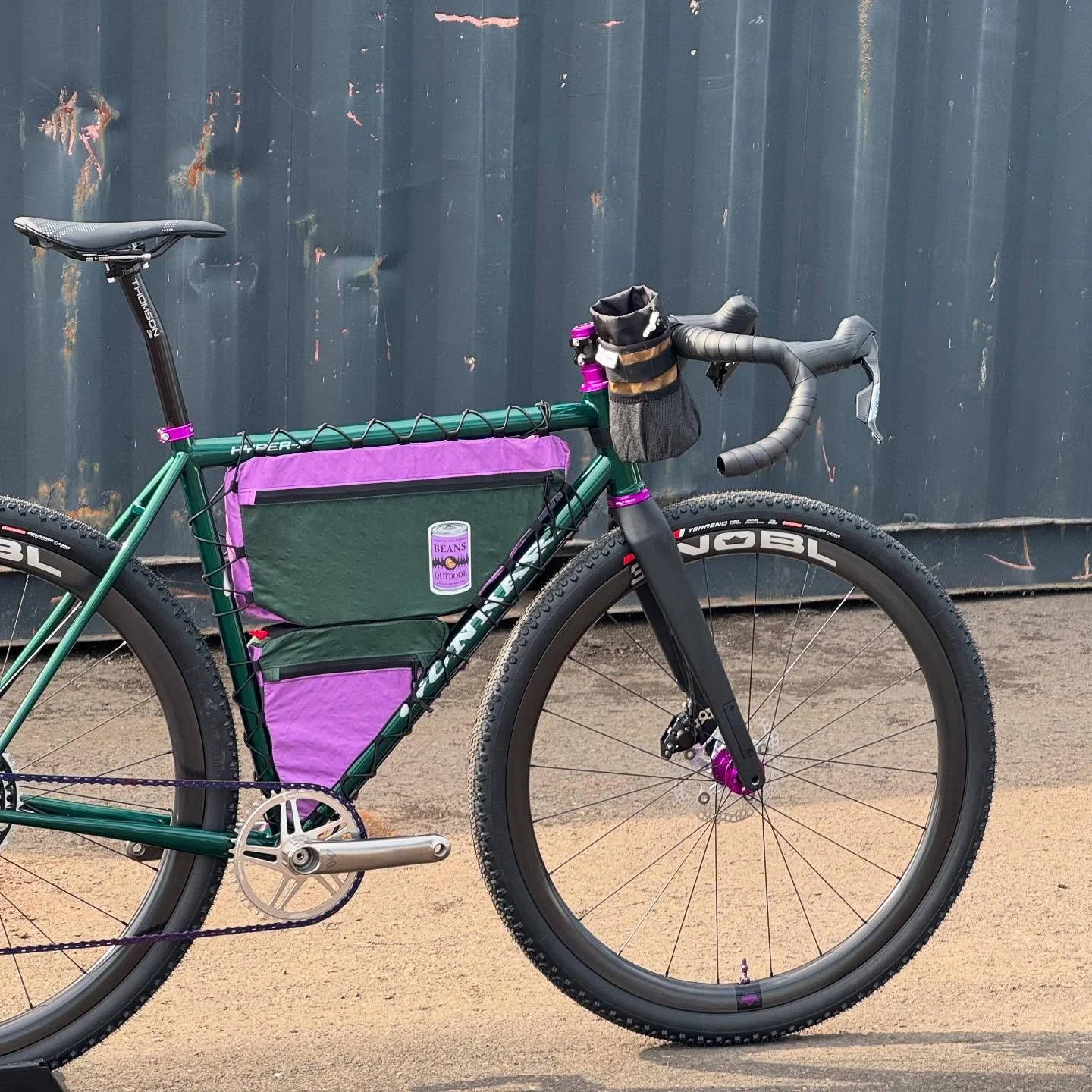 Made some friends at @made.bike this weekend. This custom green and purple frame bag happened to fit on the sick green and purple bike from @sanitas_cycles. Thanks for sharing such an awesome bike!