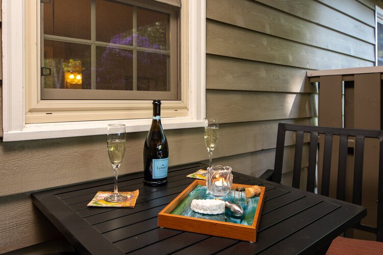 Hors d'oeuvres and wine on Private Cottage deck